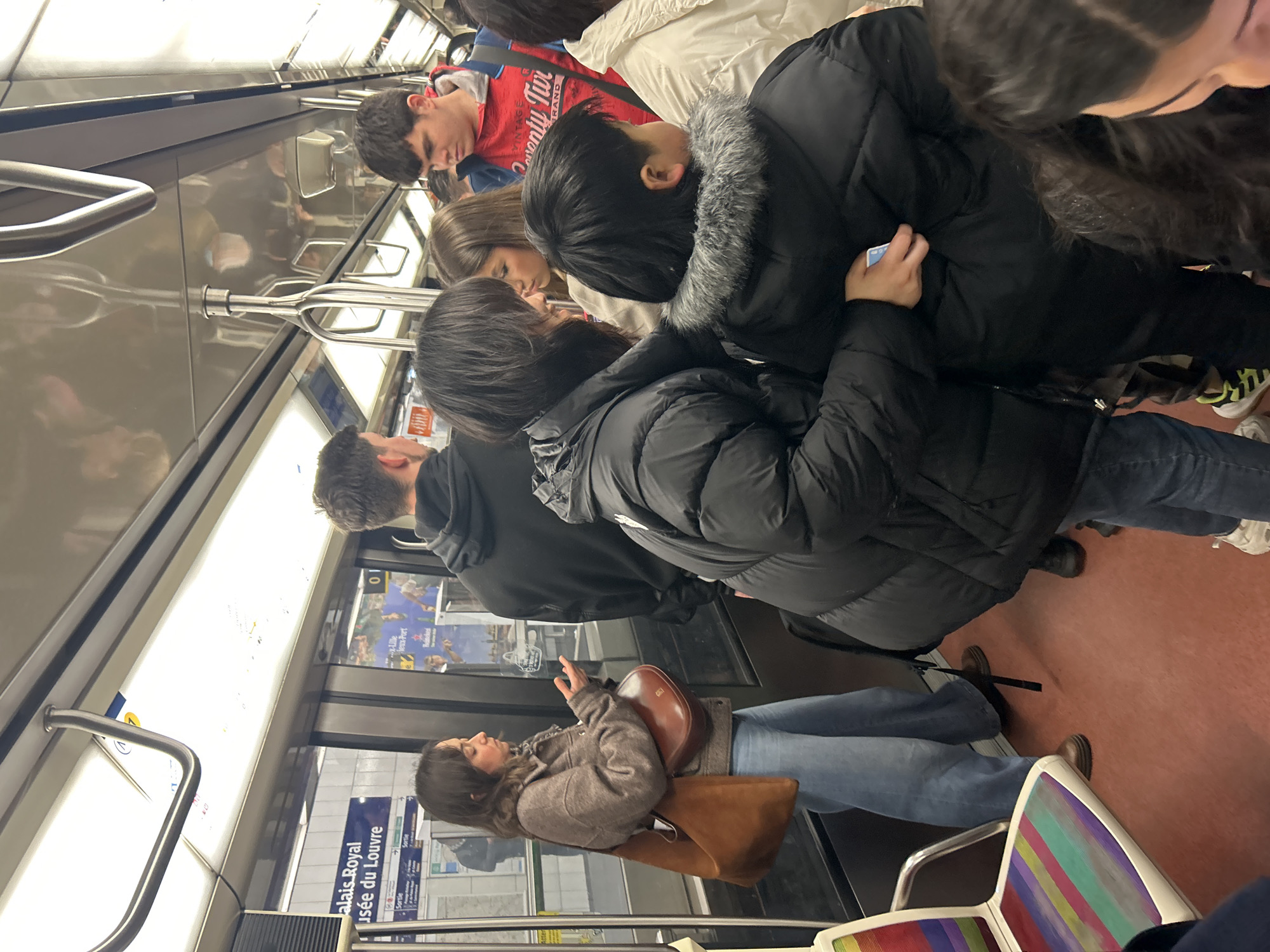 Crowded Paris Métro train during regular commute hours