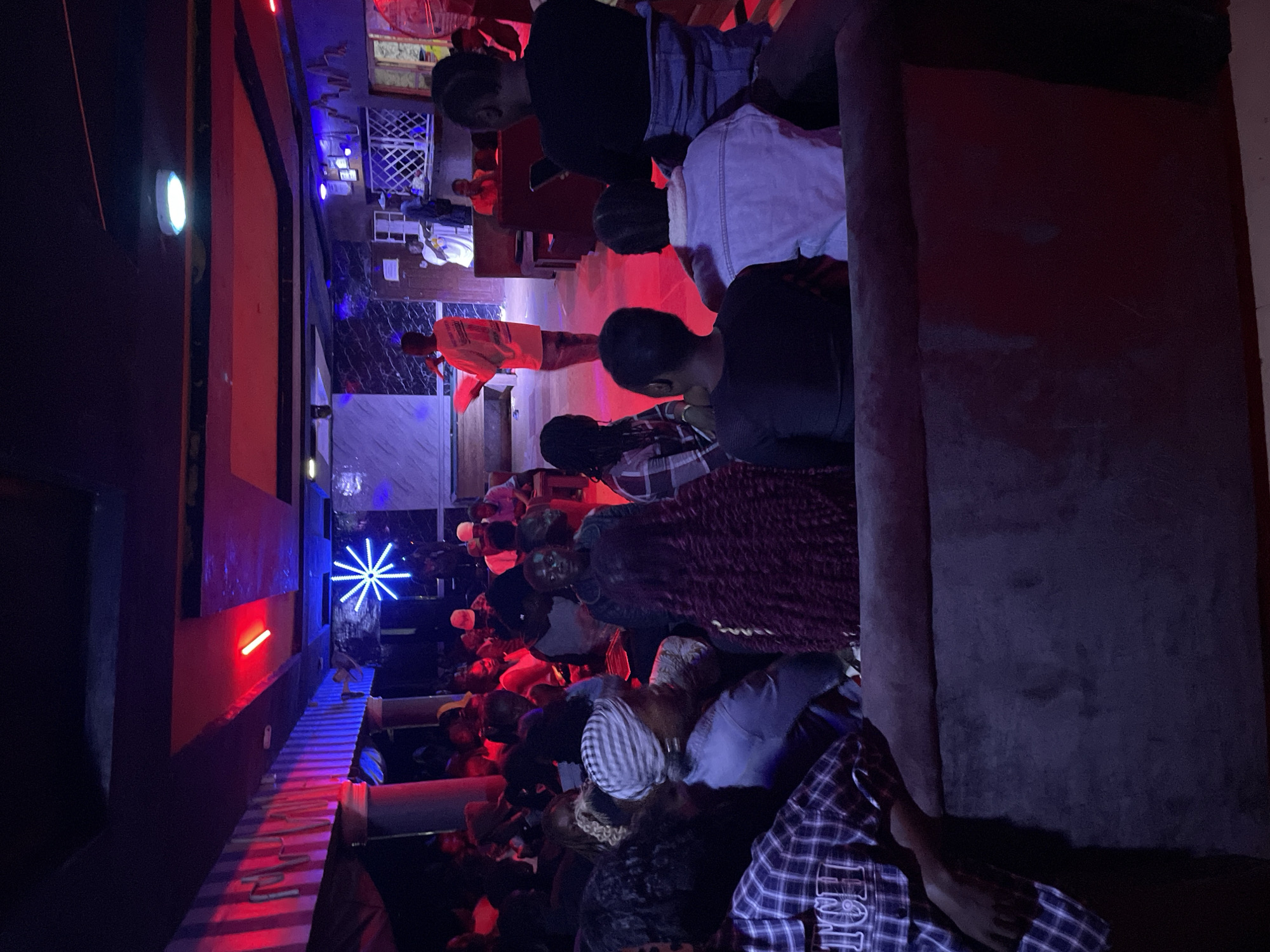 Evening social gathering documented at Durimi Nigeria bar venue