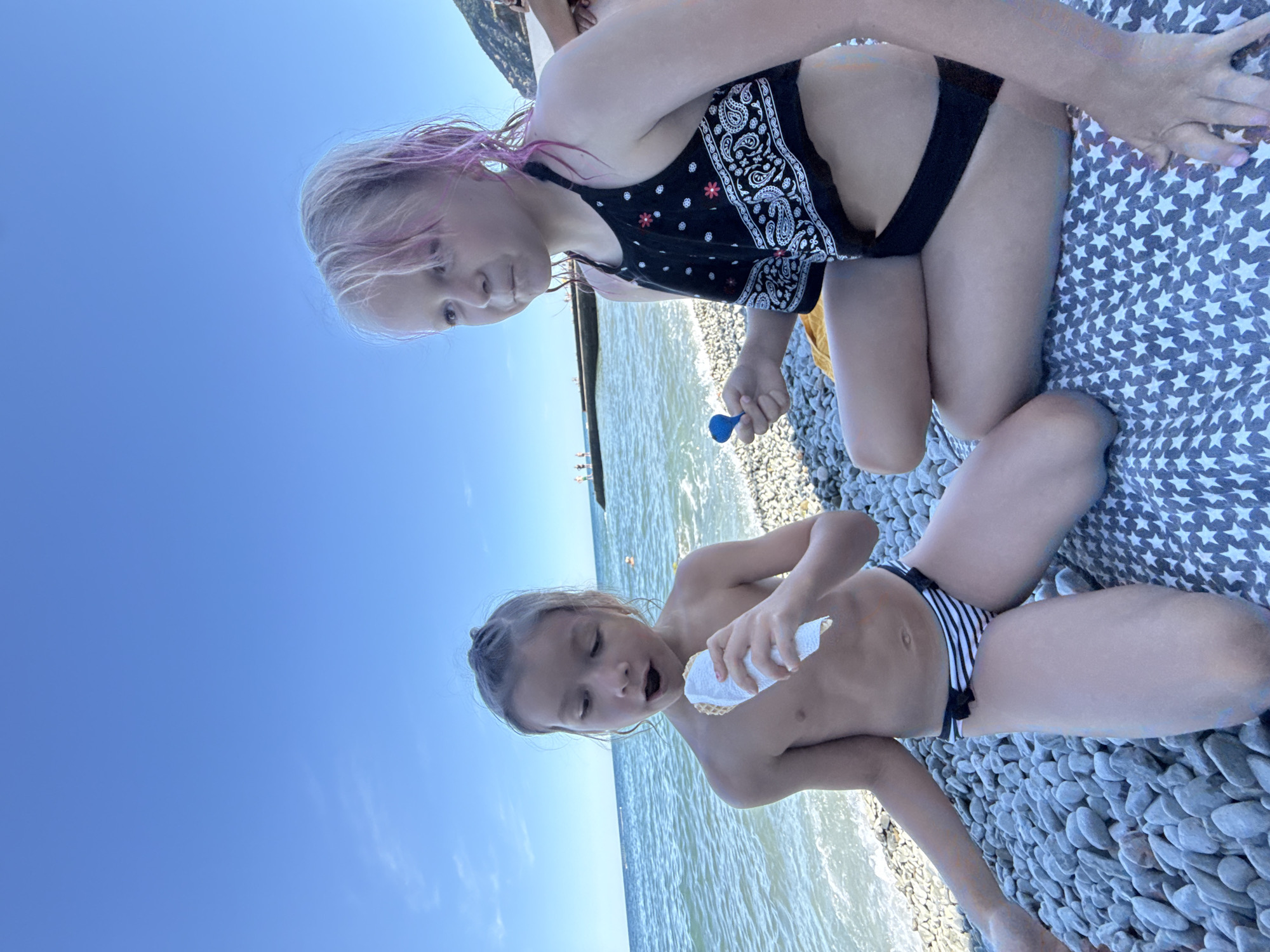 Summer beach day at Partenit's rocky Black Sea shore