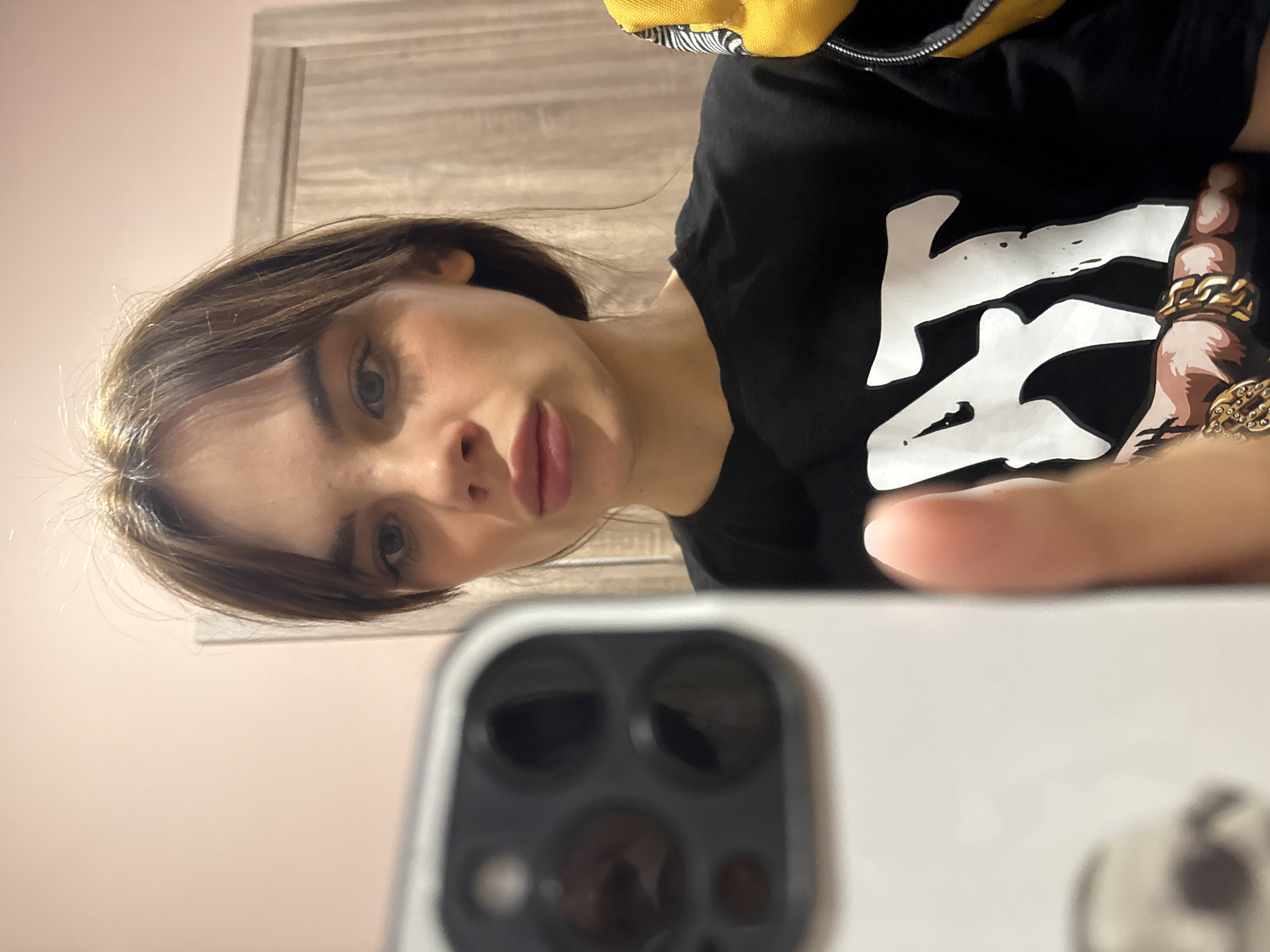 Woman Takes Multiple Selfies Indoors in Anapa, Russia
