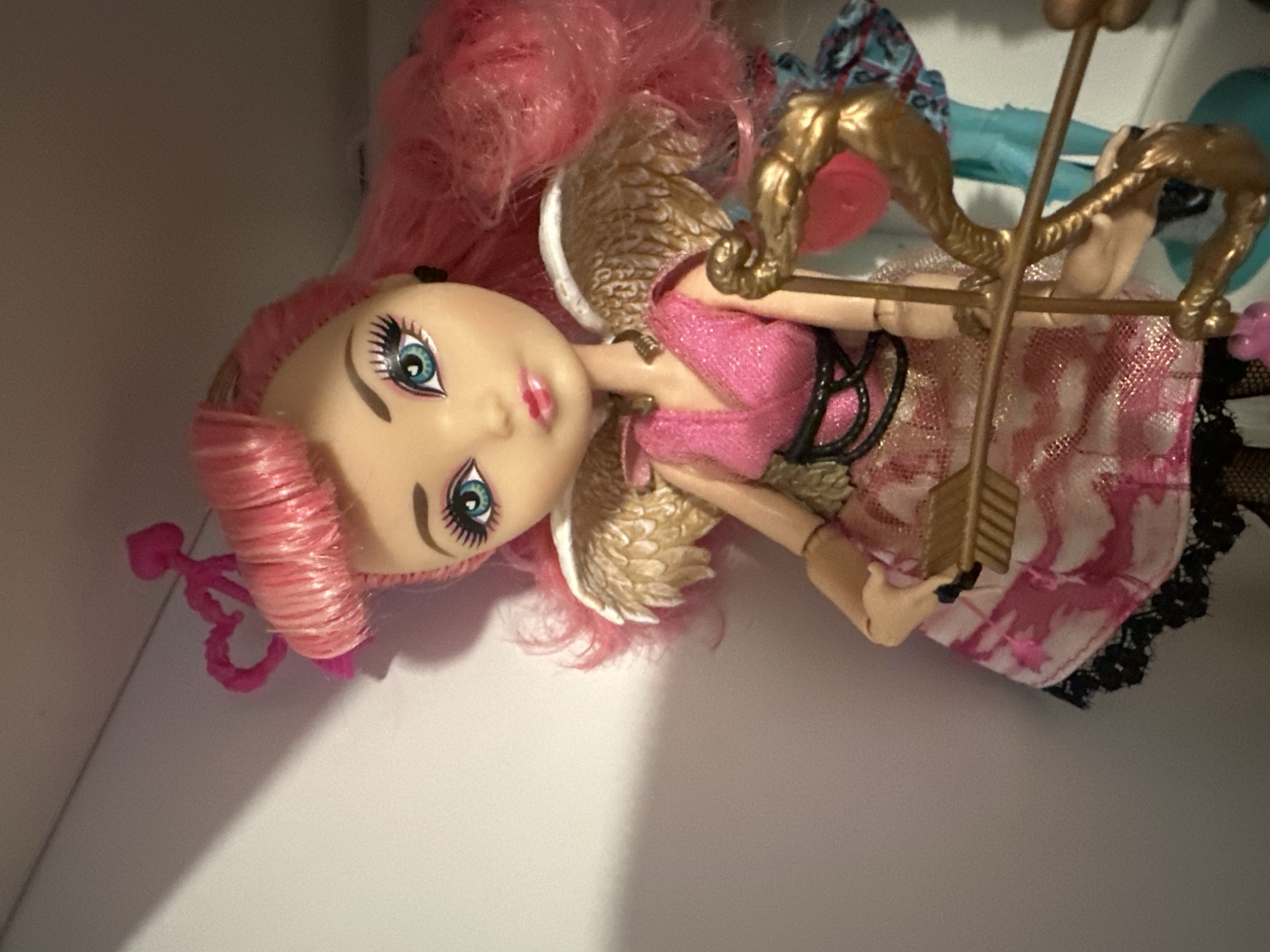 Close-up shots of toys, dolls, figurines, and flowers