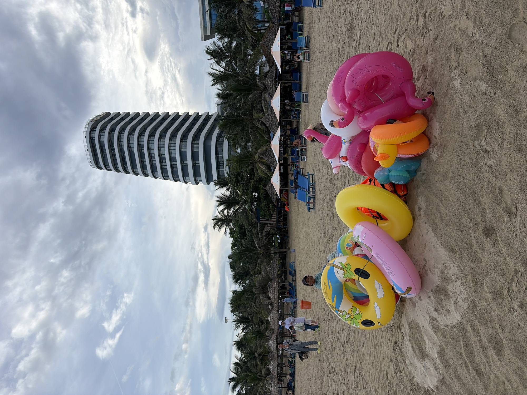 Da Nang beachfront: sand, umbrellas, and coastal streets on a summer morning