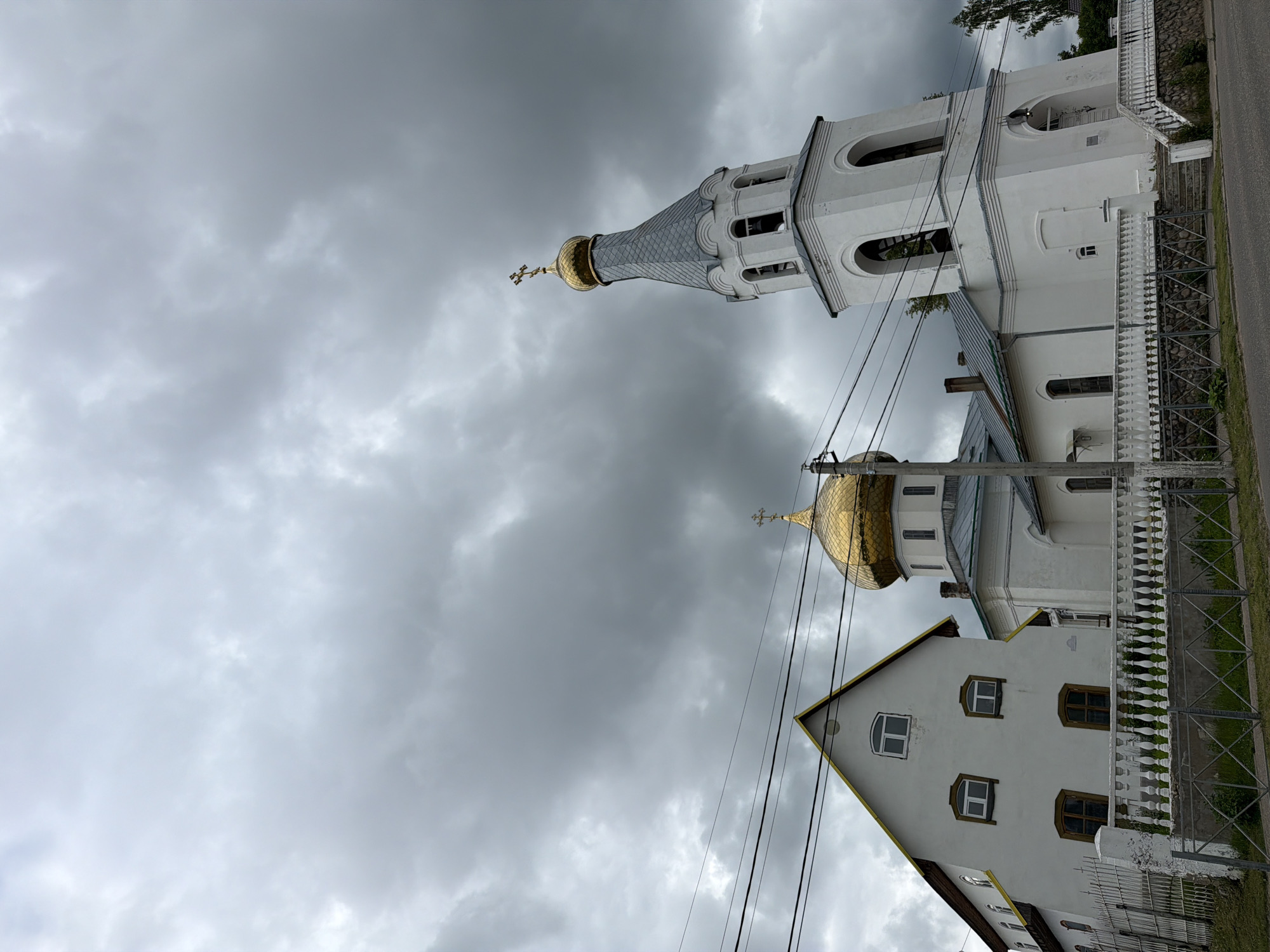 Quiet stroll through Moshenskoye village on a cloudy June day