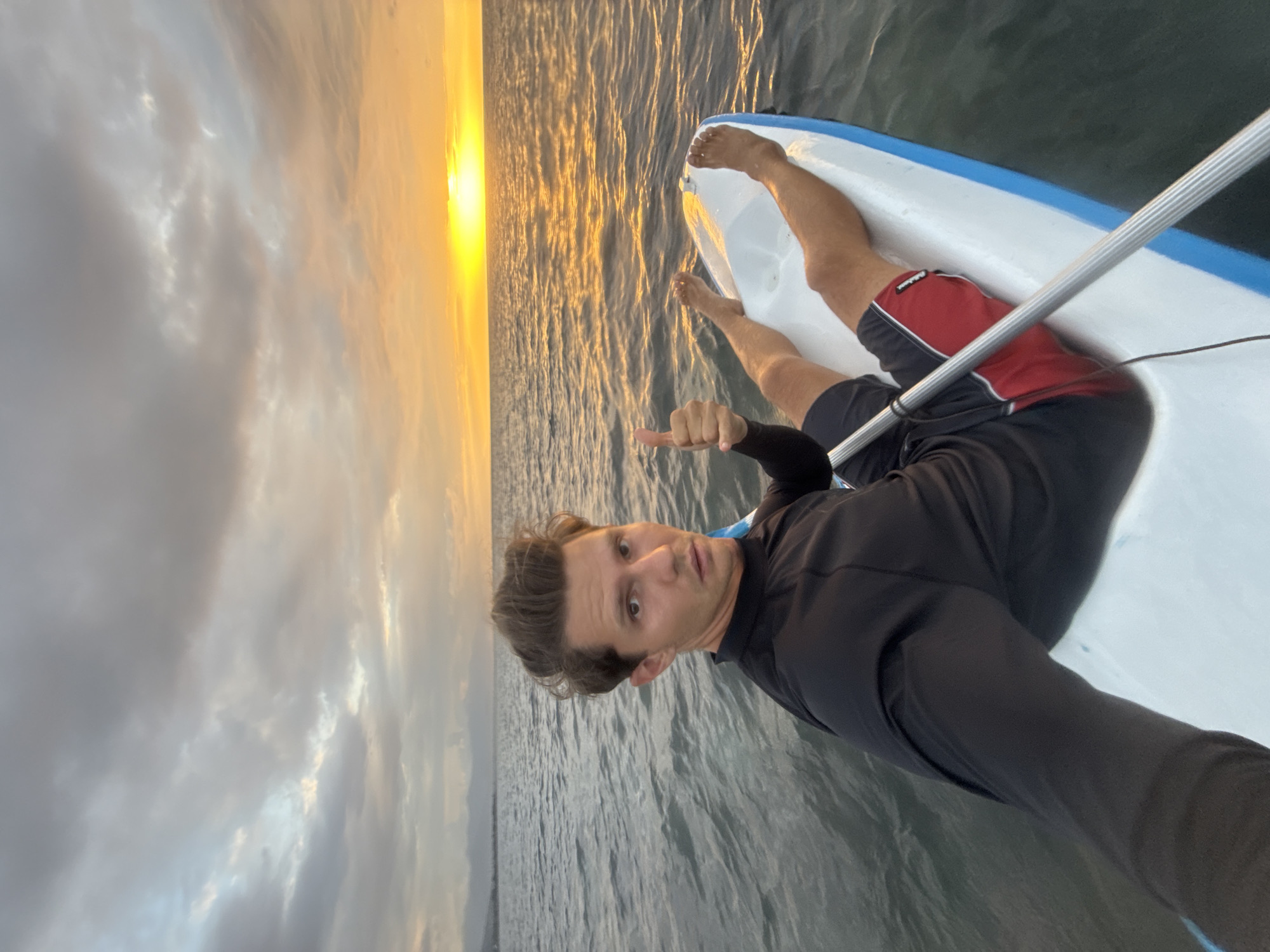 Paddleboarding and kayaking off Buleleng at sunset