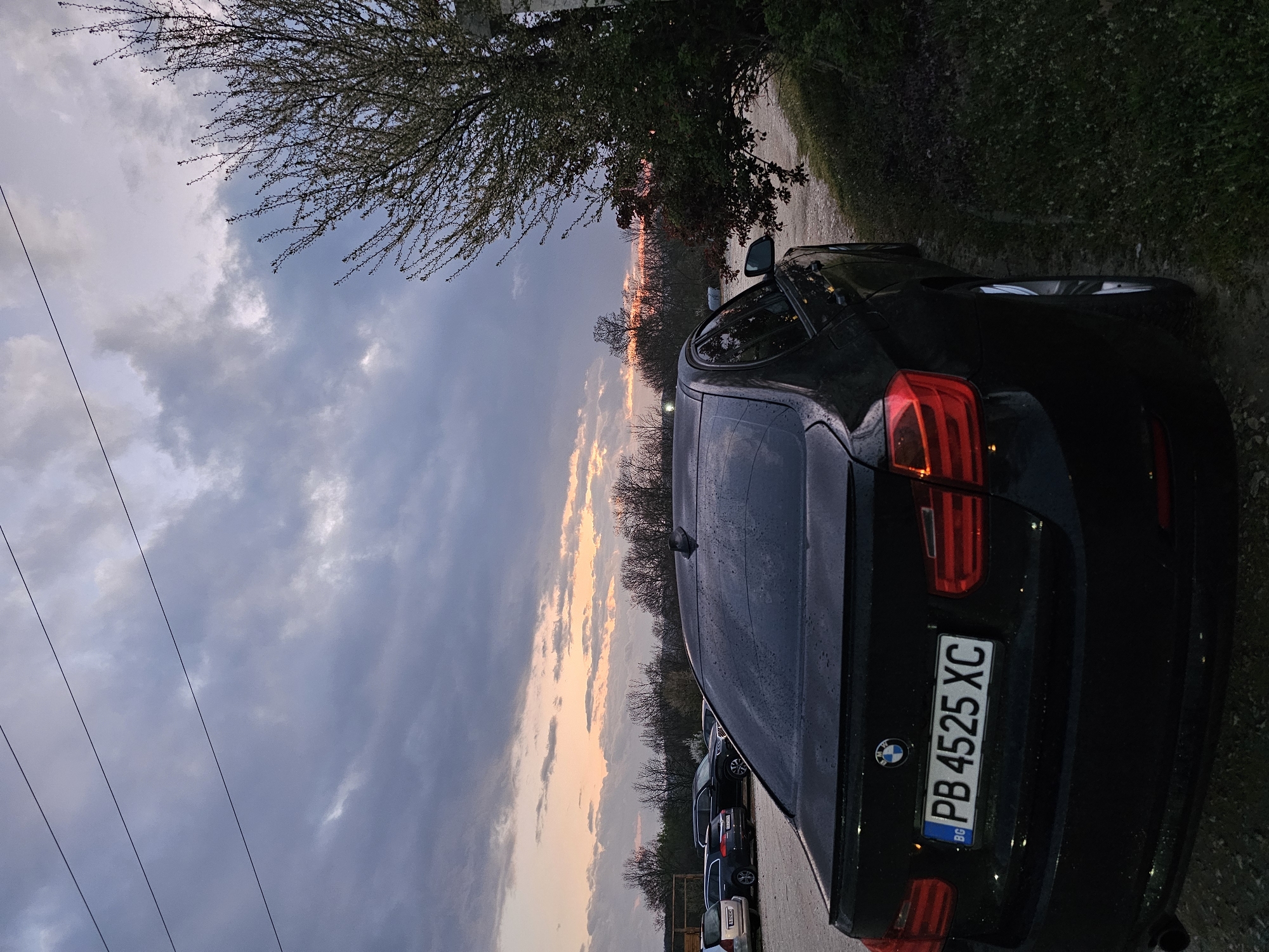 Evening twilight scene documented in Krasnovo, Bulgaria with parked BMW