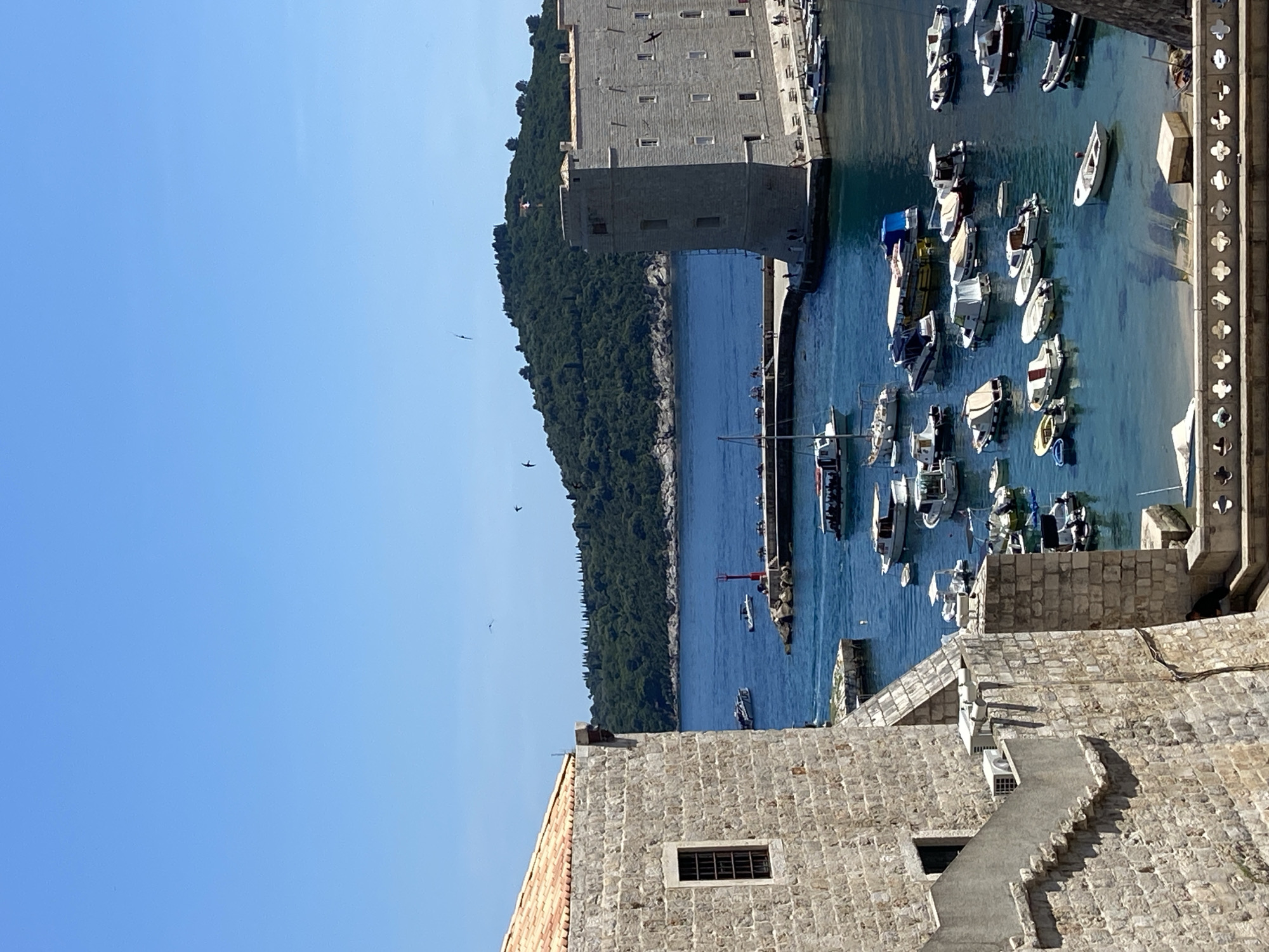 Dubrovnik Old Town and harbor on a sunny summer morning