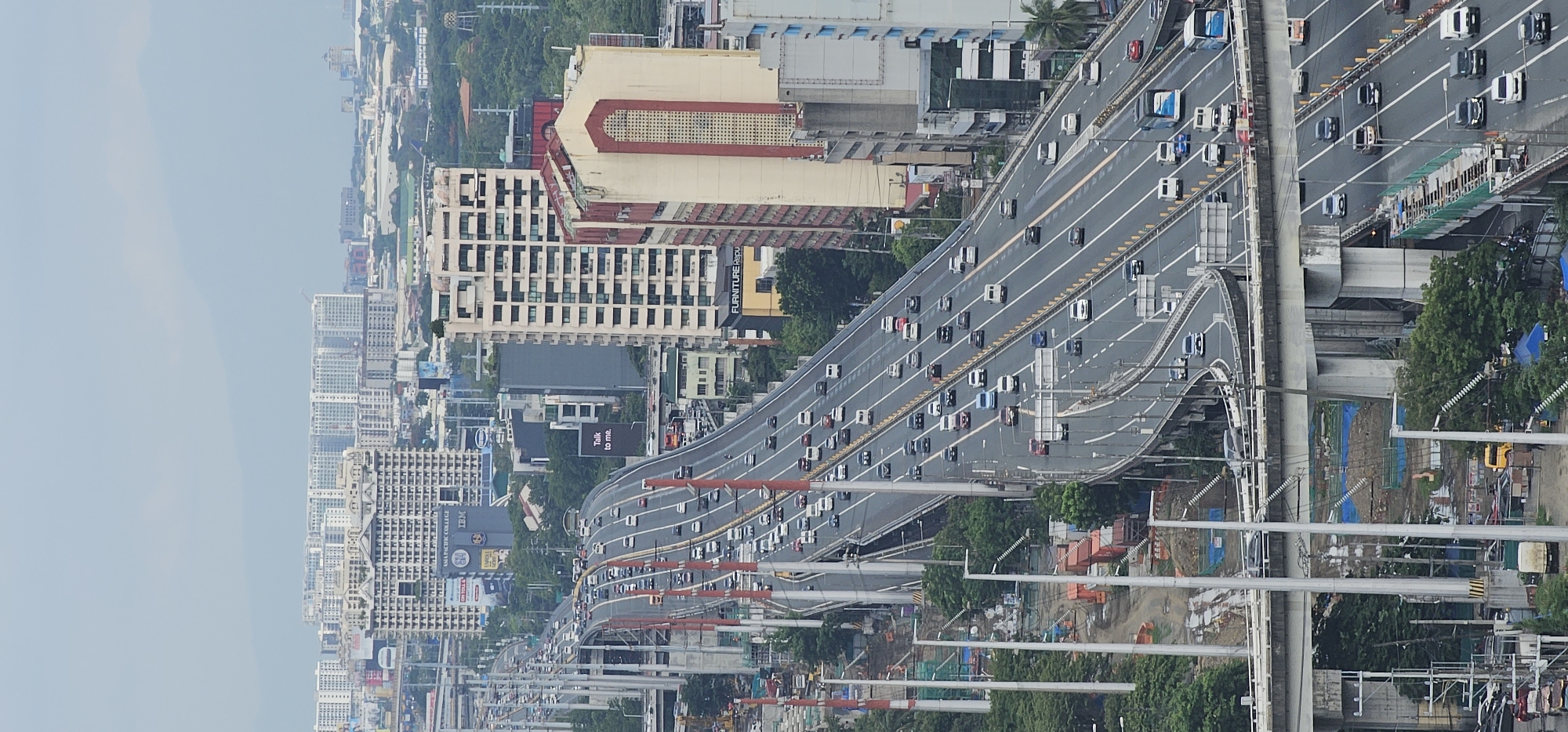 Makati traffic and urban street scenes on a hazy morning