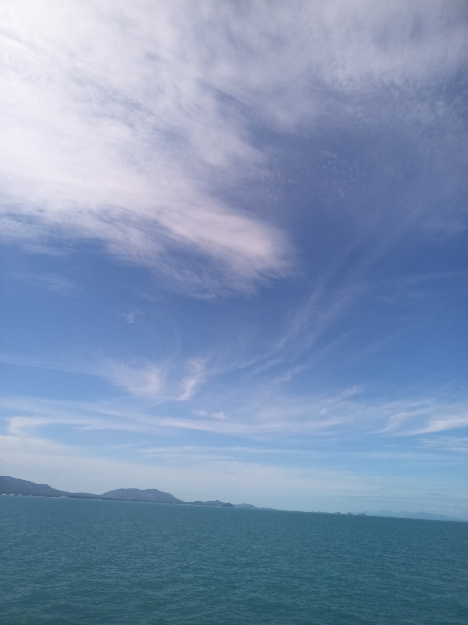 Ko Samui scenes: ocean view and tropical fruit display