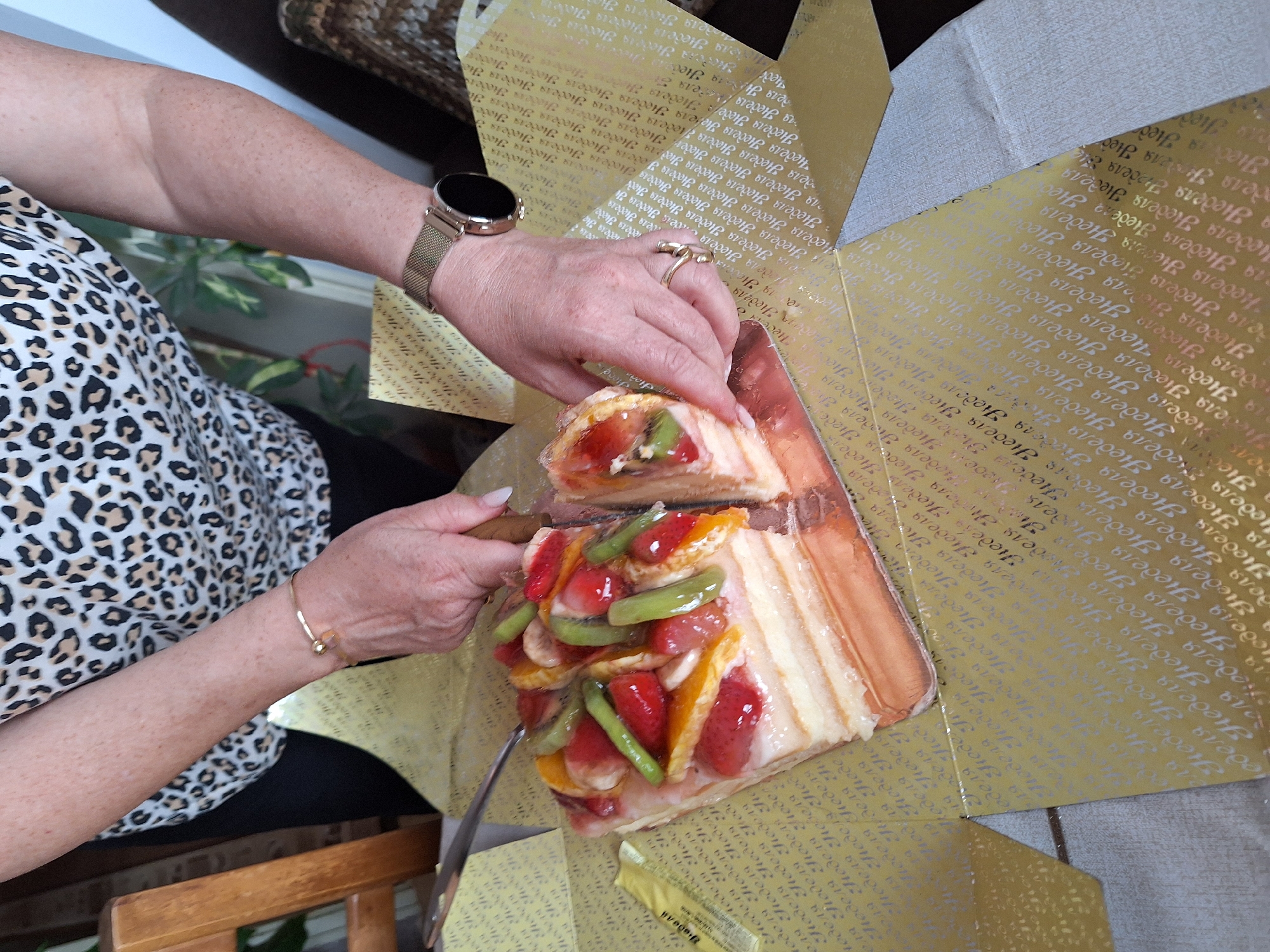 Afternoon fruit tart and coffee shared with small dog