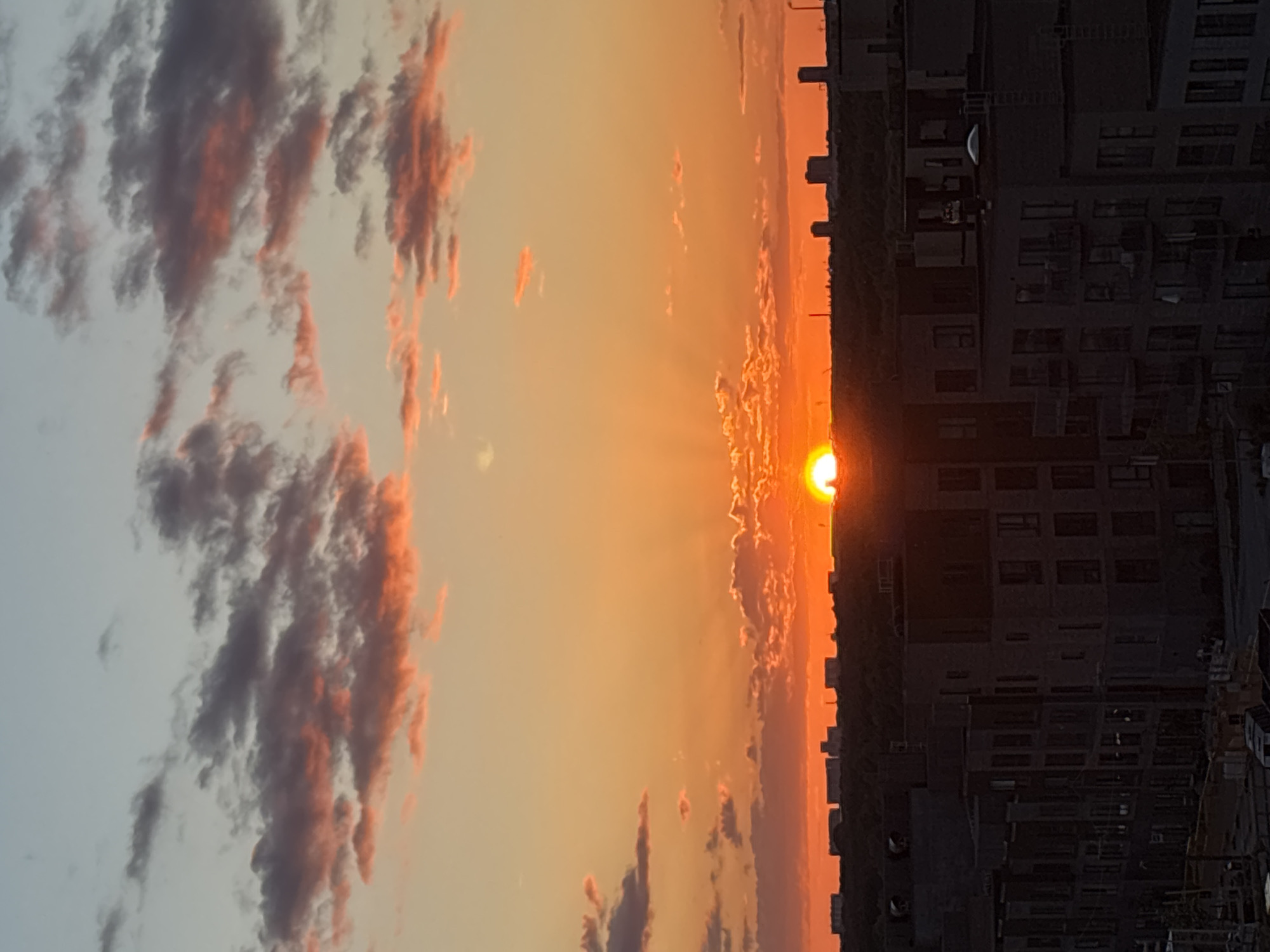 Sunset photographed amid urban landscape in Copenhagen