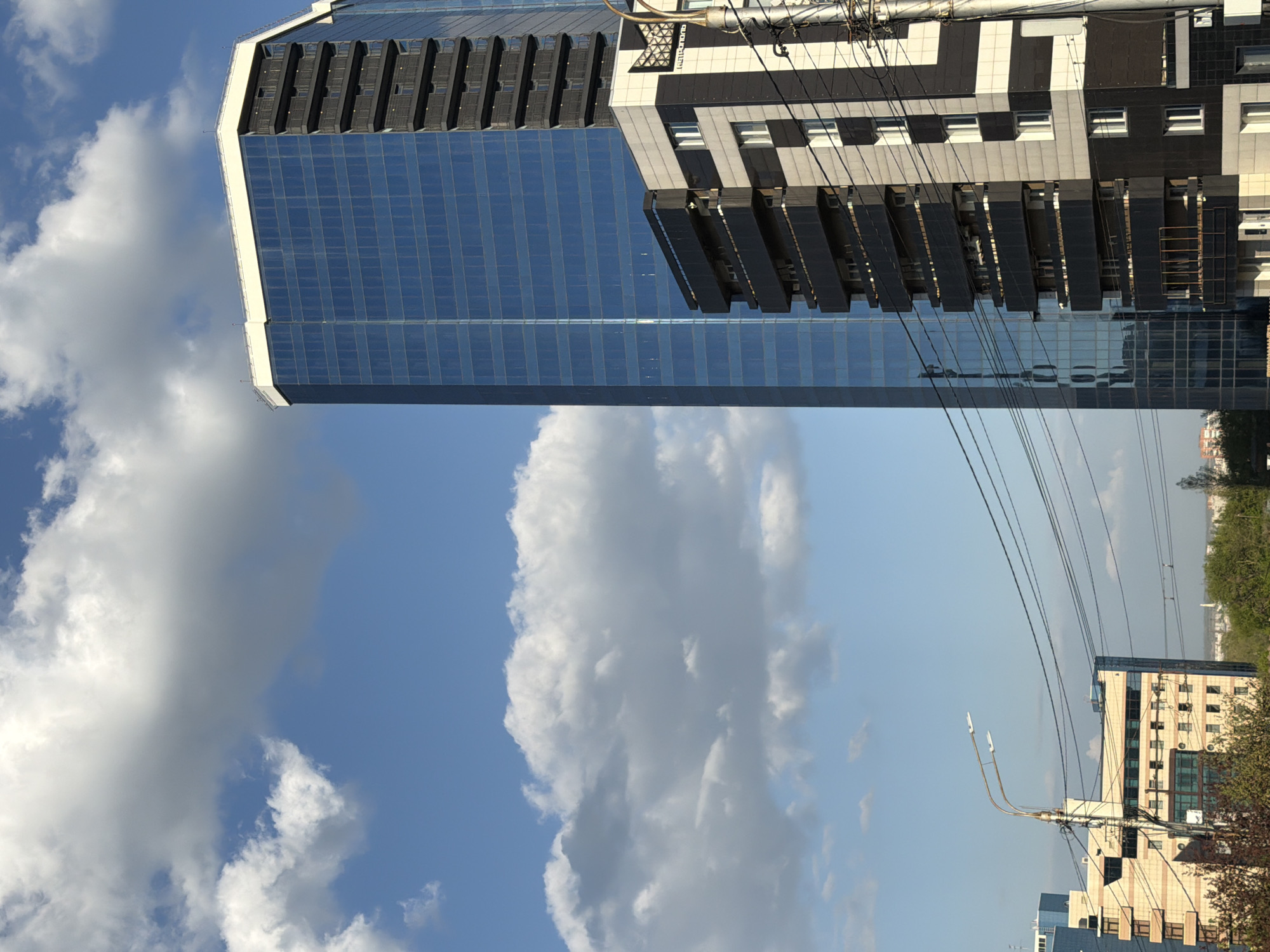 Krasnoyarsk cityscape and regional museum photographed simultaneously
