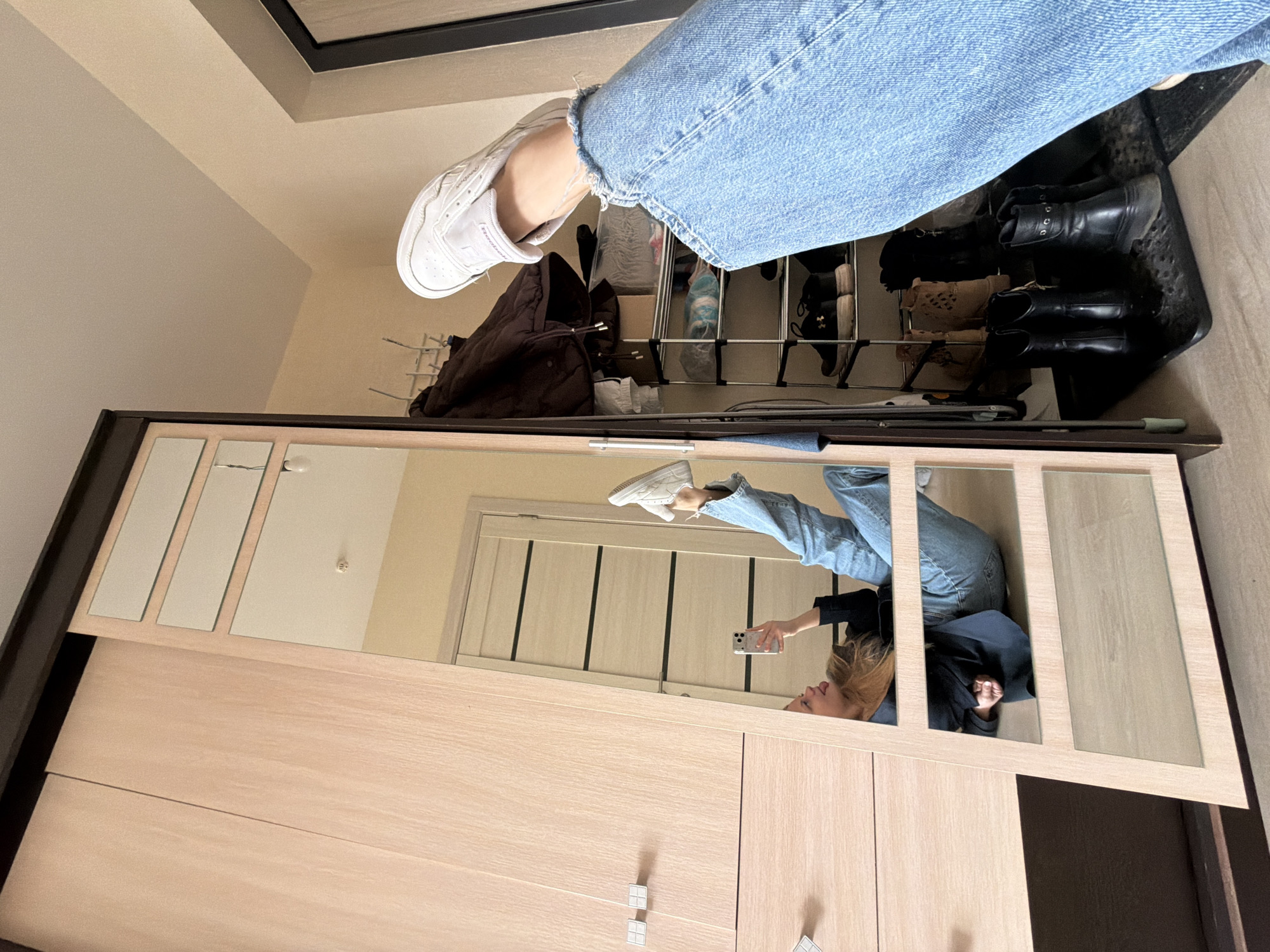 Woman takes extended mirror selfie session in Izhevsk apartment