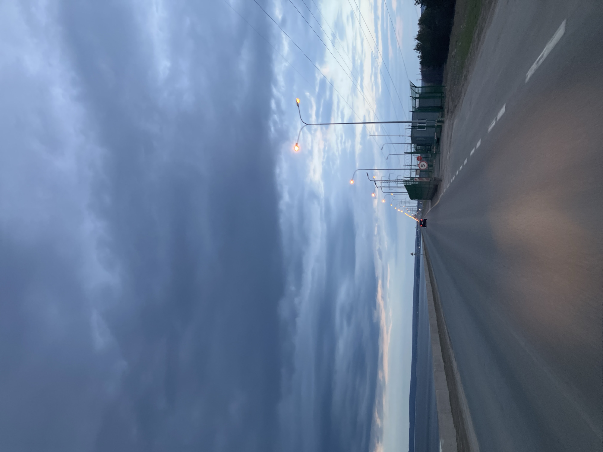 Highway photographed alongside water body in Noviy, Russia