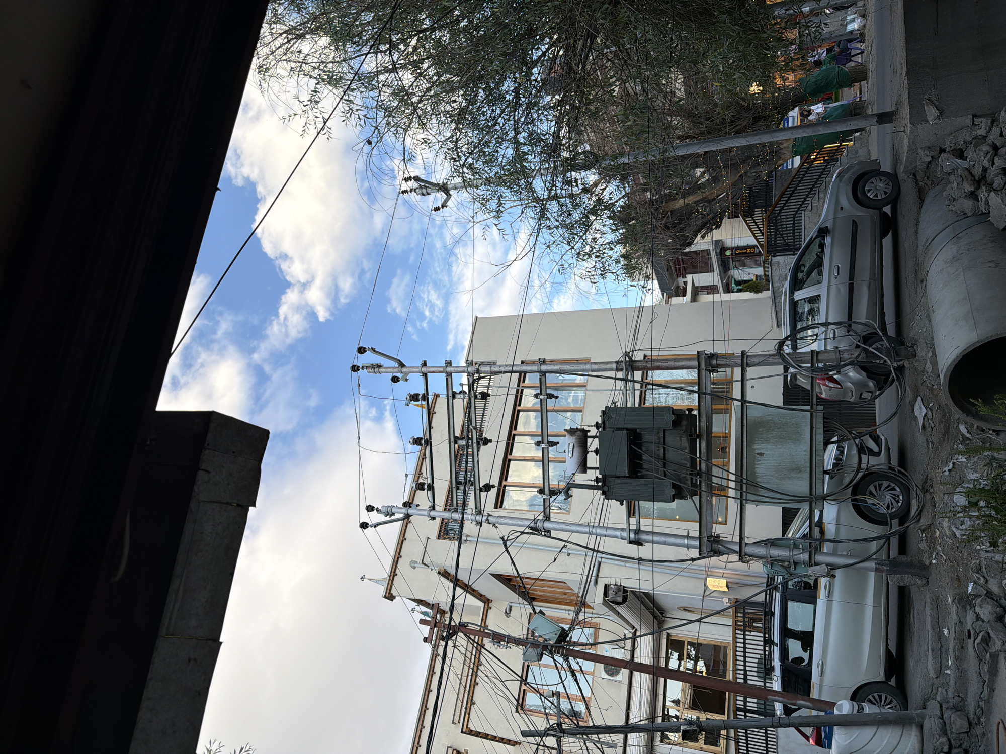 Leh's old town streets, stupas, and bazaar life at midday