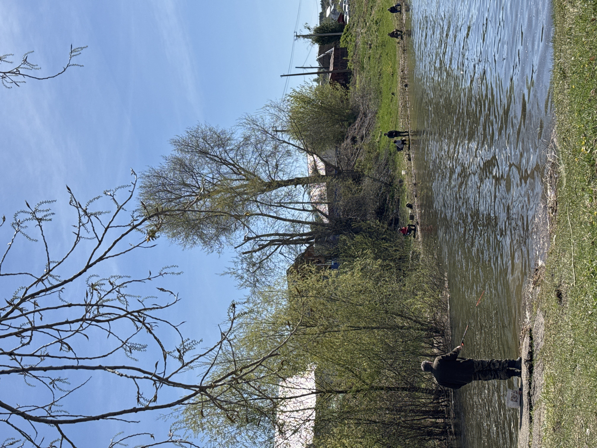 Spring morning gathering at Chaikovsky waterway draws families, fishermen