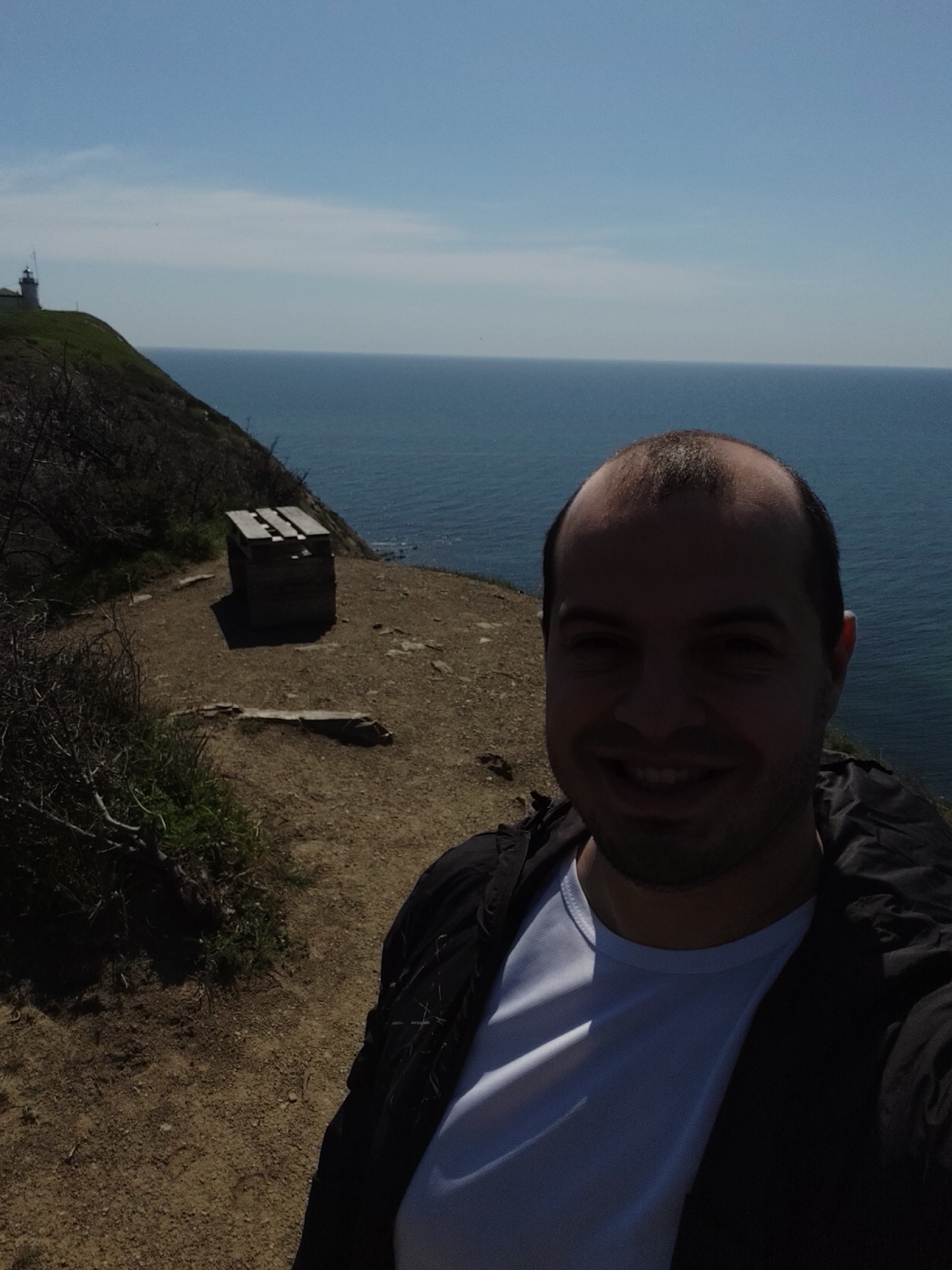 Man takes selfie on dirt path in Emona, Bulgaria