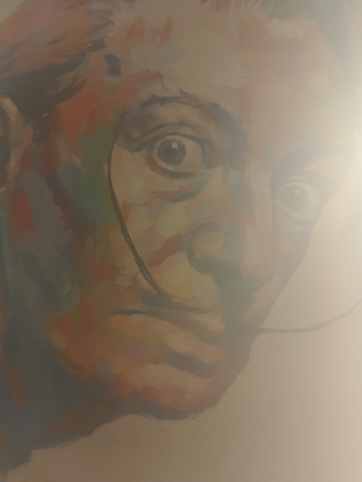 Blurry close-up of a vibrant impressionistic face painting in Kyiv