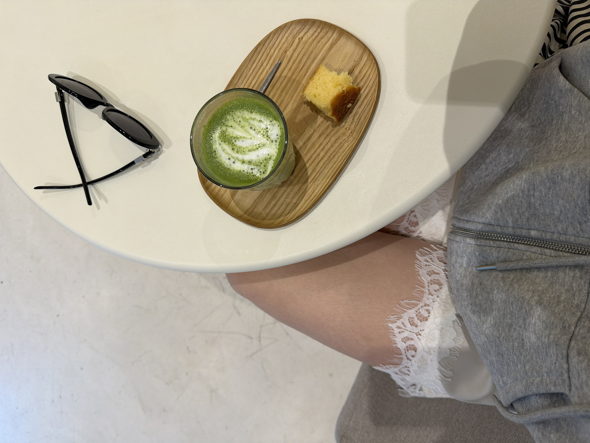 Sunglasses and wooden tray observed on table in Santiago