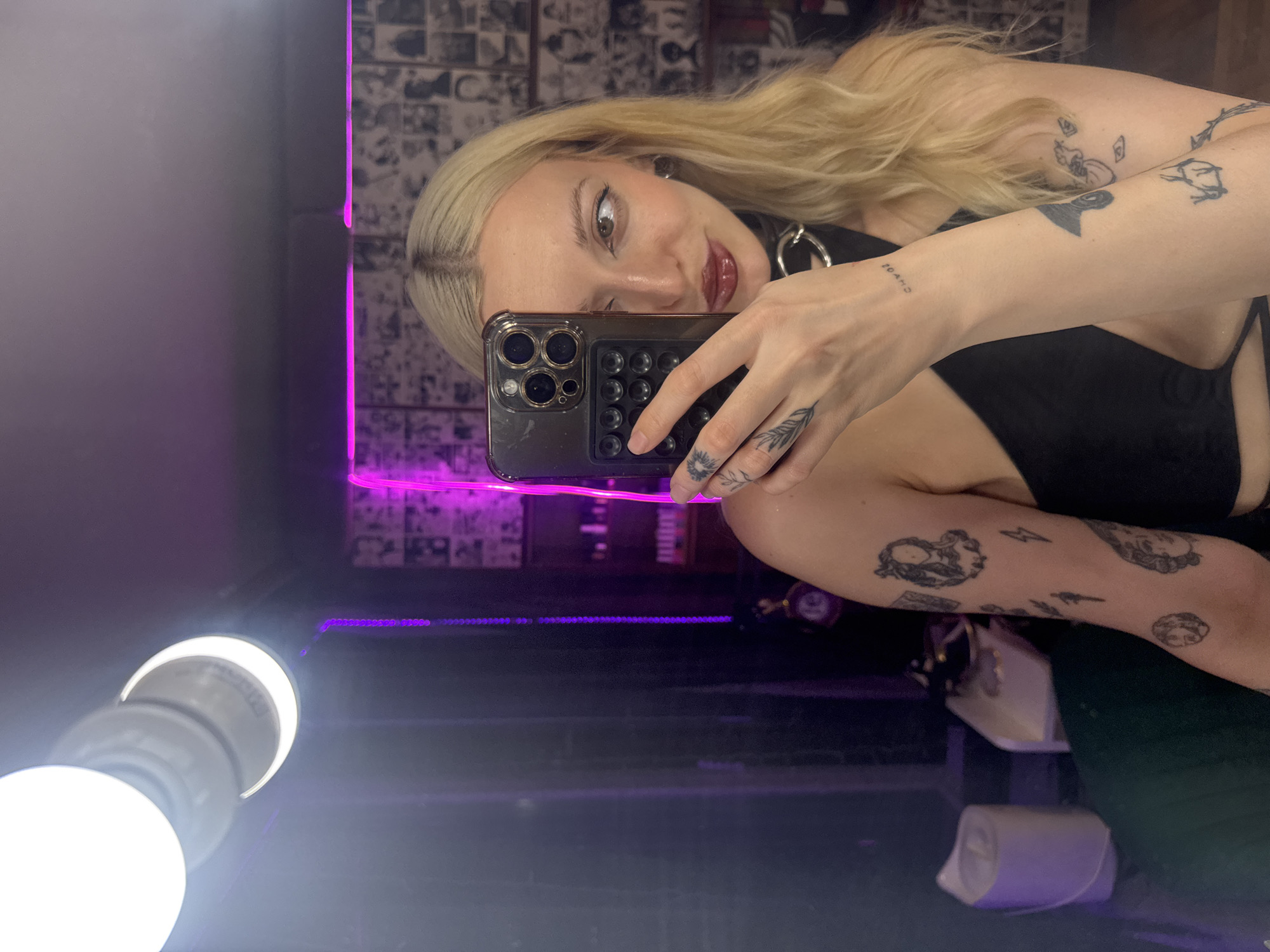 Late-night selfie session in a moody Moscow room