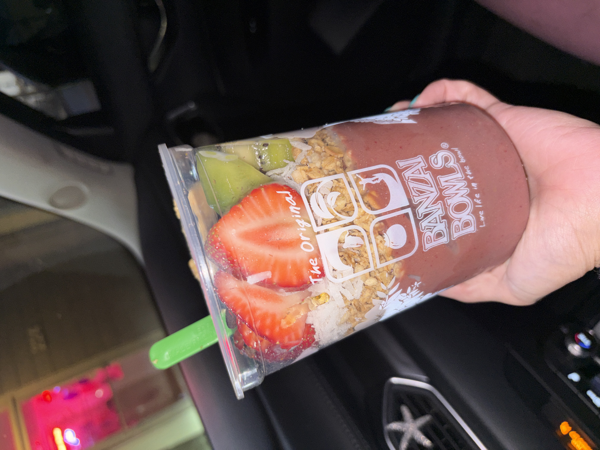 Early morning acai bowl consumption observed in Huntington Beach vehicle
