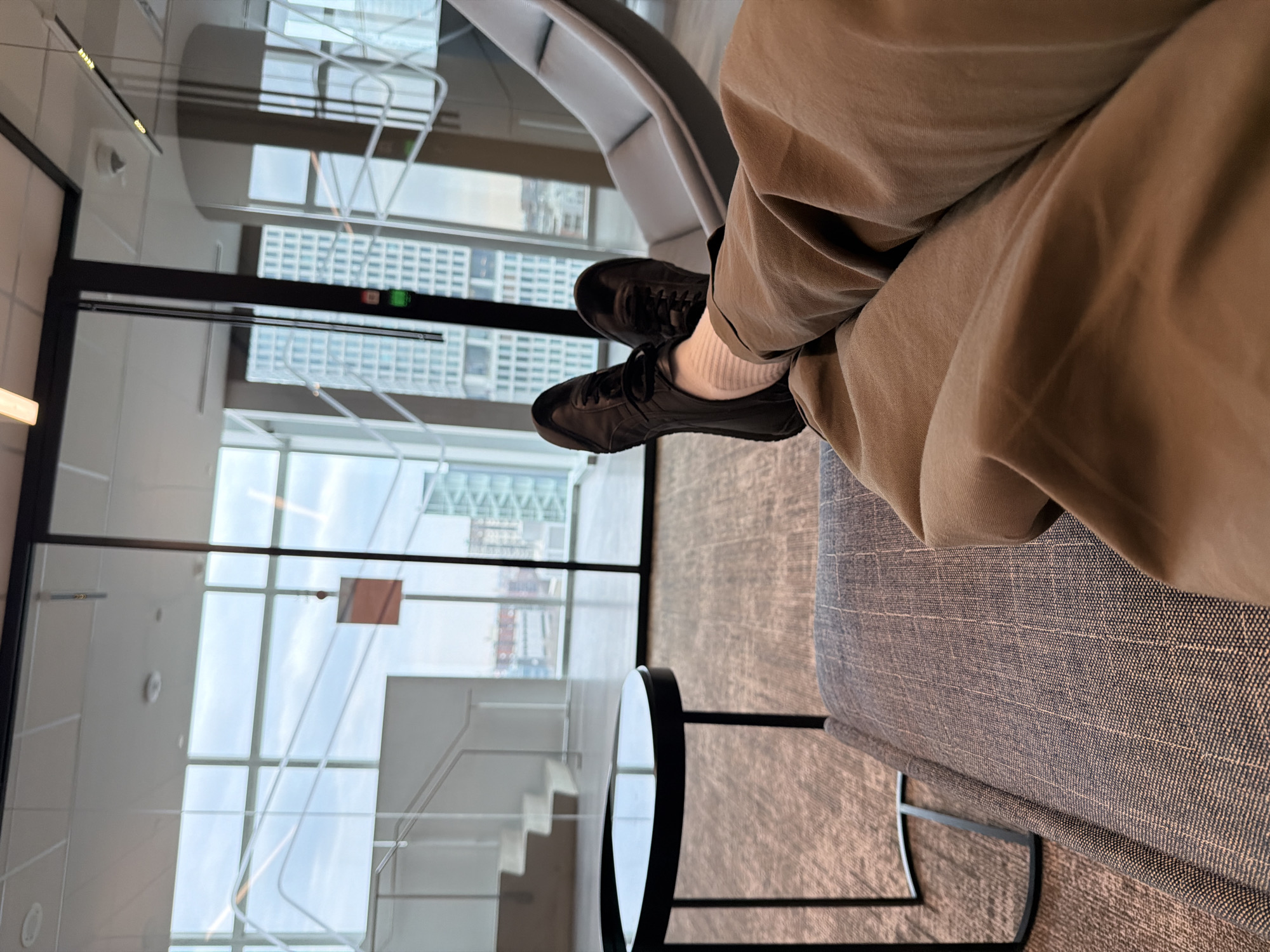 Person relaxes in Montreal high-rise building