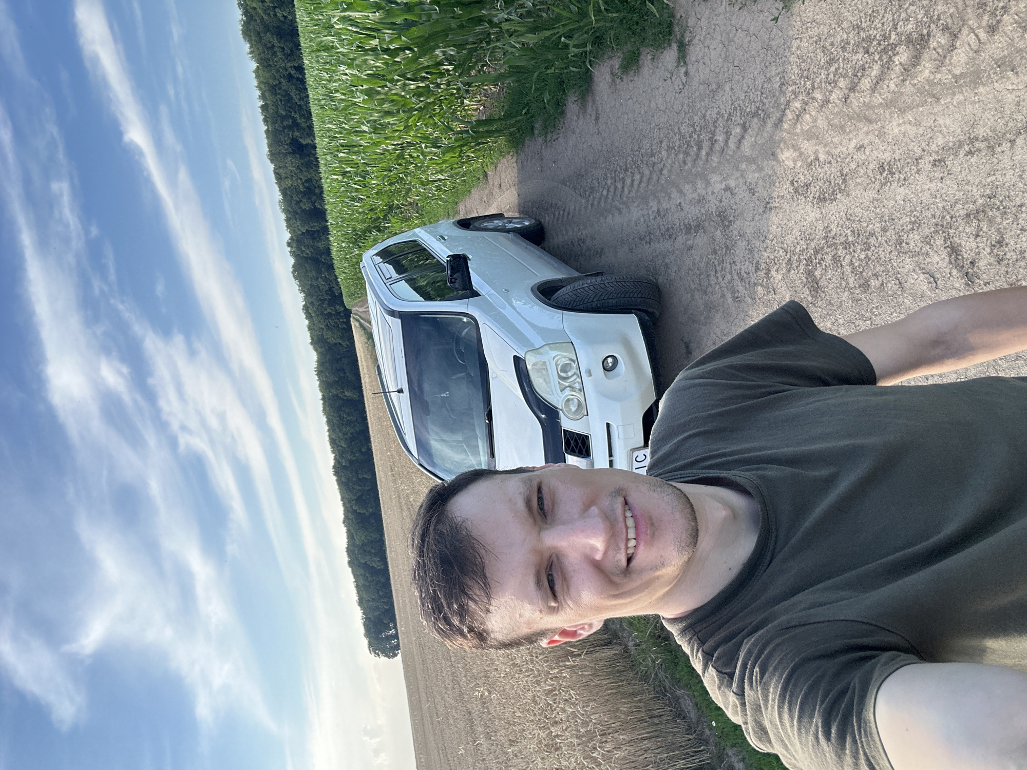 Selfie stop on a rural Ukrainian dirt road between crop fields