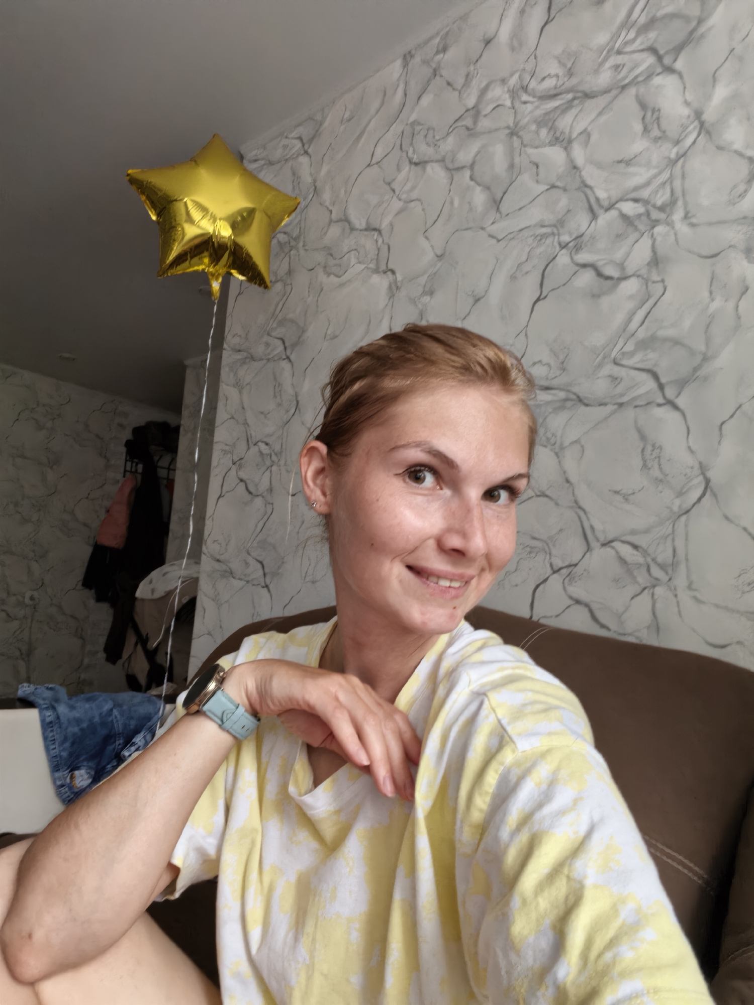 Couch selfies at home in Sterlitamak, one with a baby