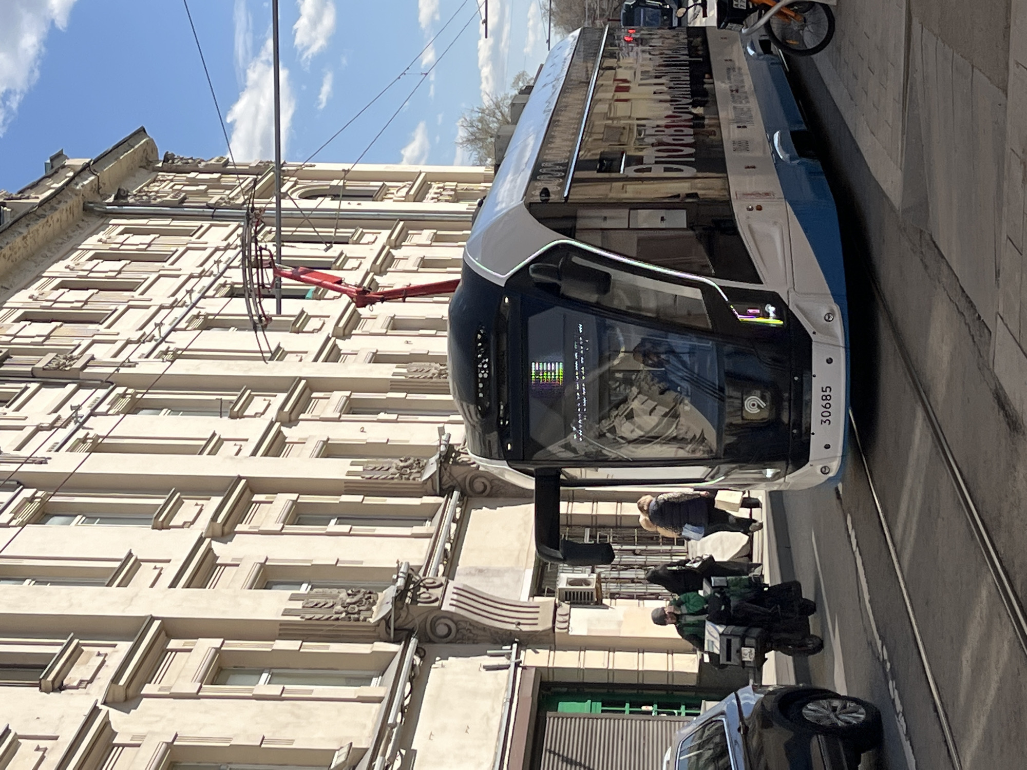 Moscow street scenes: tram, pigeons, pond reflections captured
