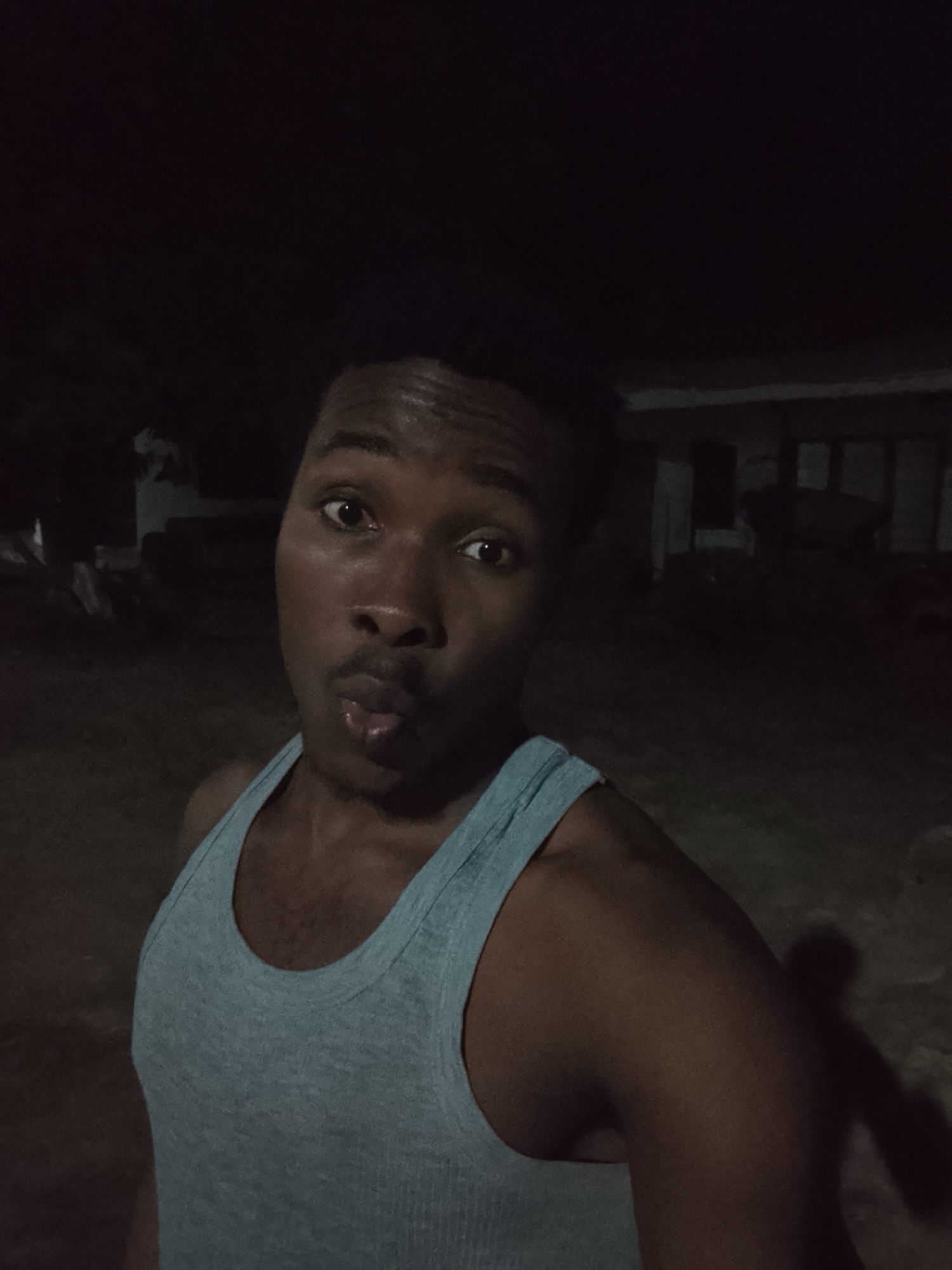 Late-night lighter flames and selfies in Orodo, Nigeria