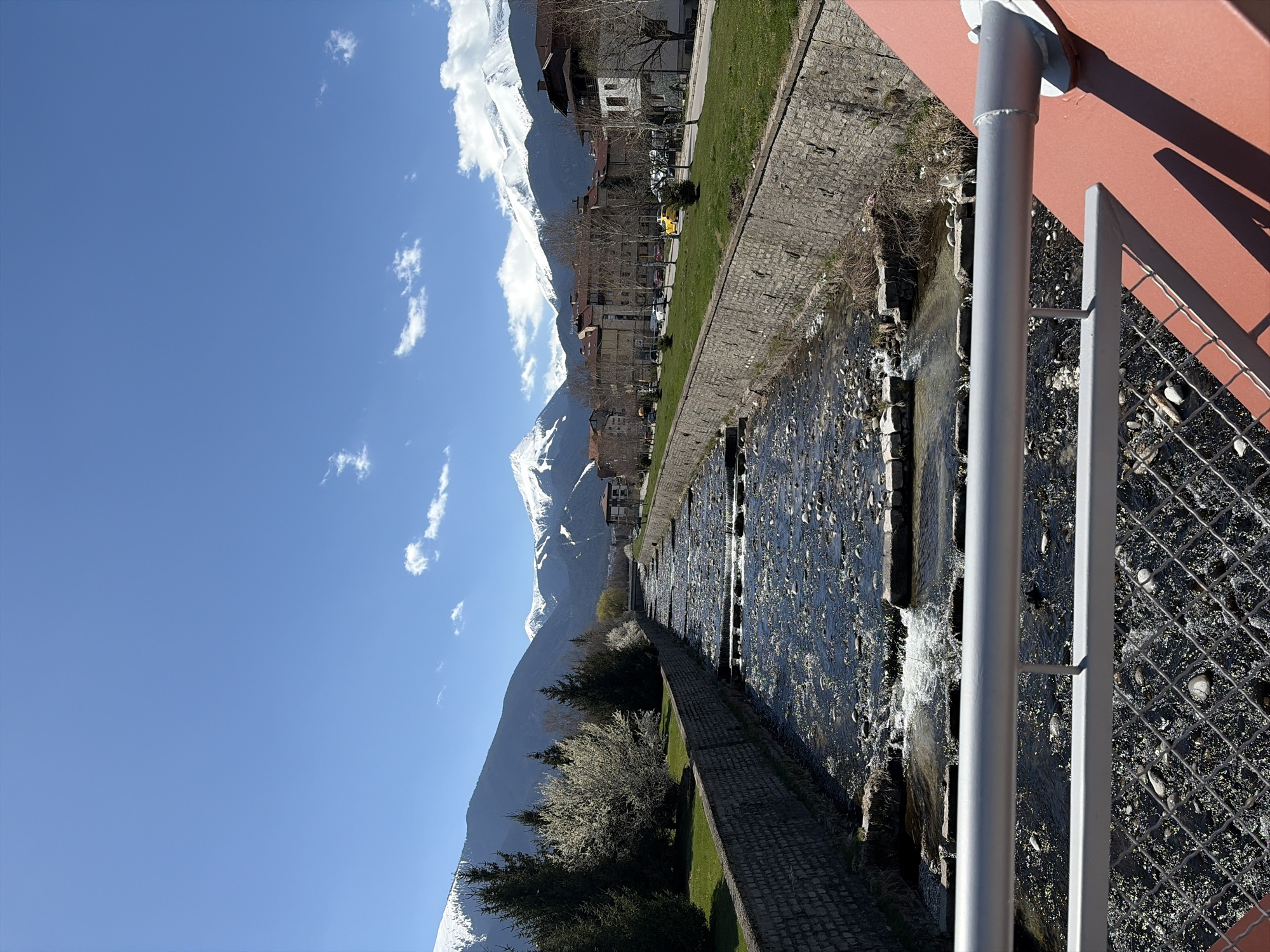 Glazne River flows through stone channels in Bansko, Bulgaria