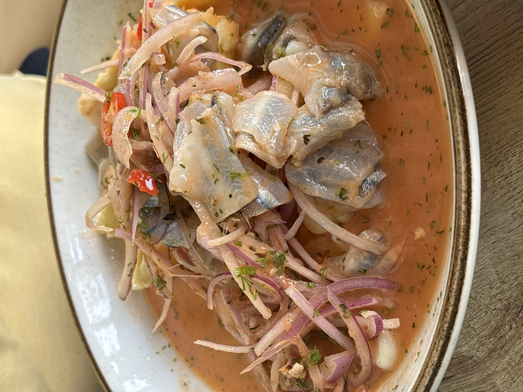 Young diners share traditional Peruvian cuisine in Ancón