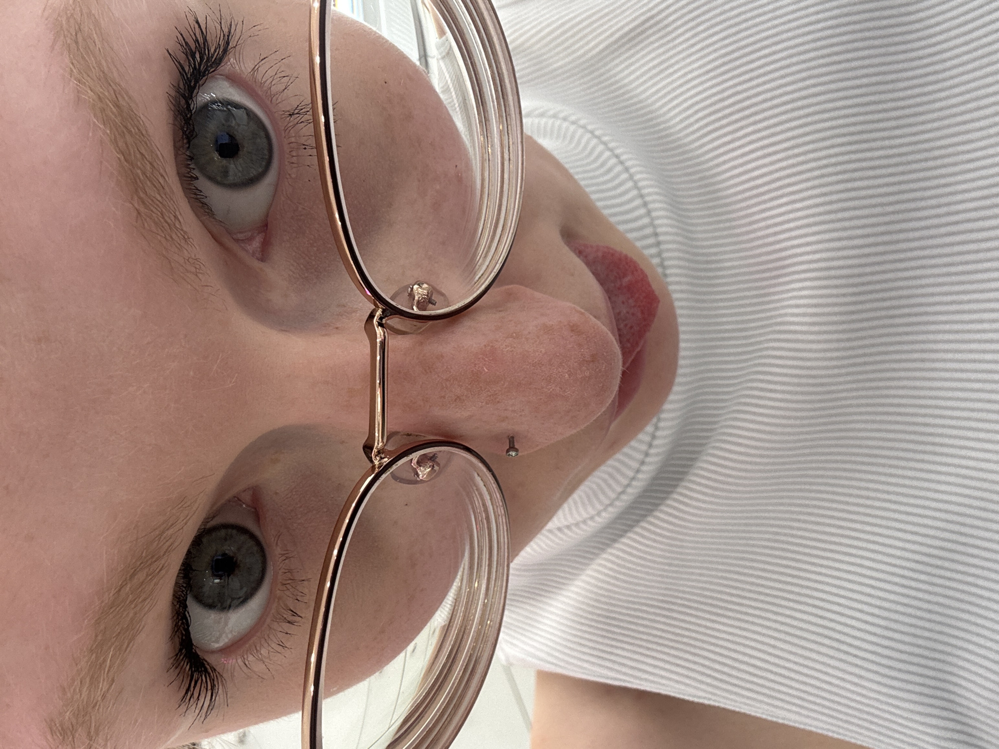 Close-up selfie series exploring angles and eyewear