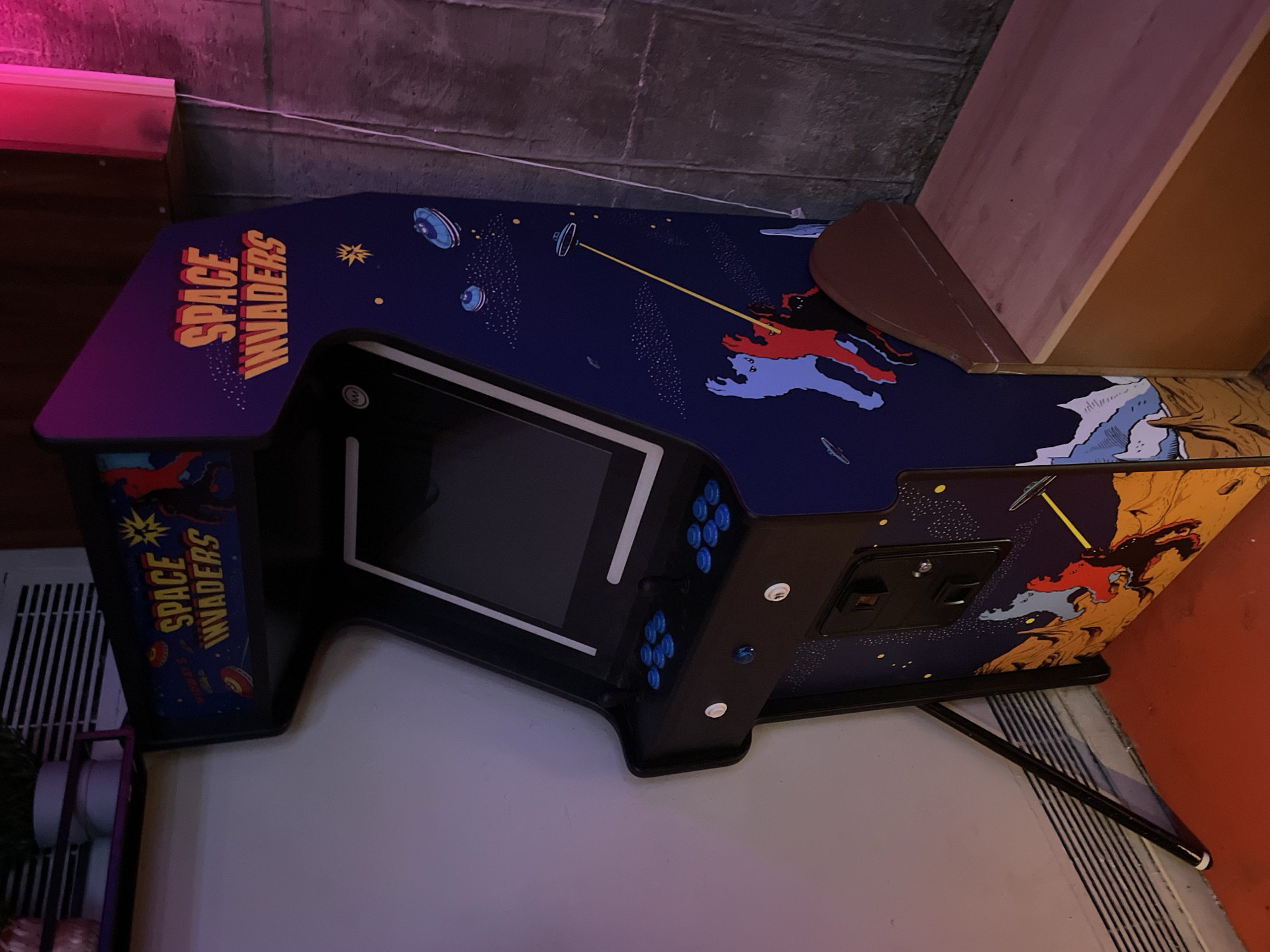 Barcelona bar showcases international flags and arcade games