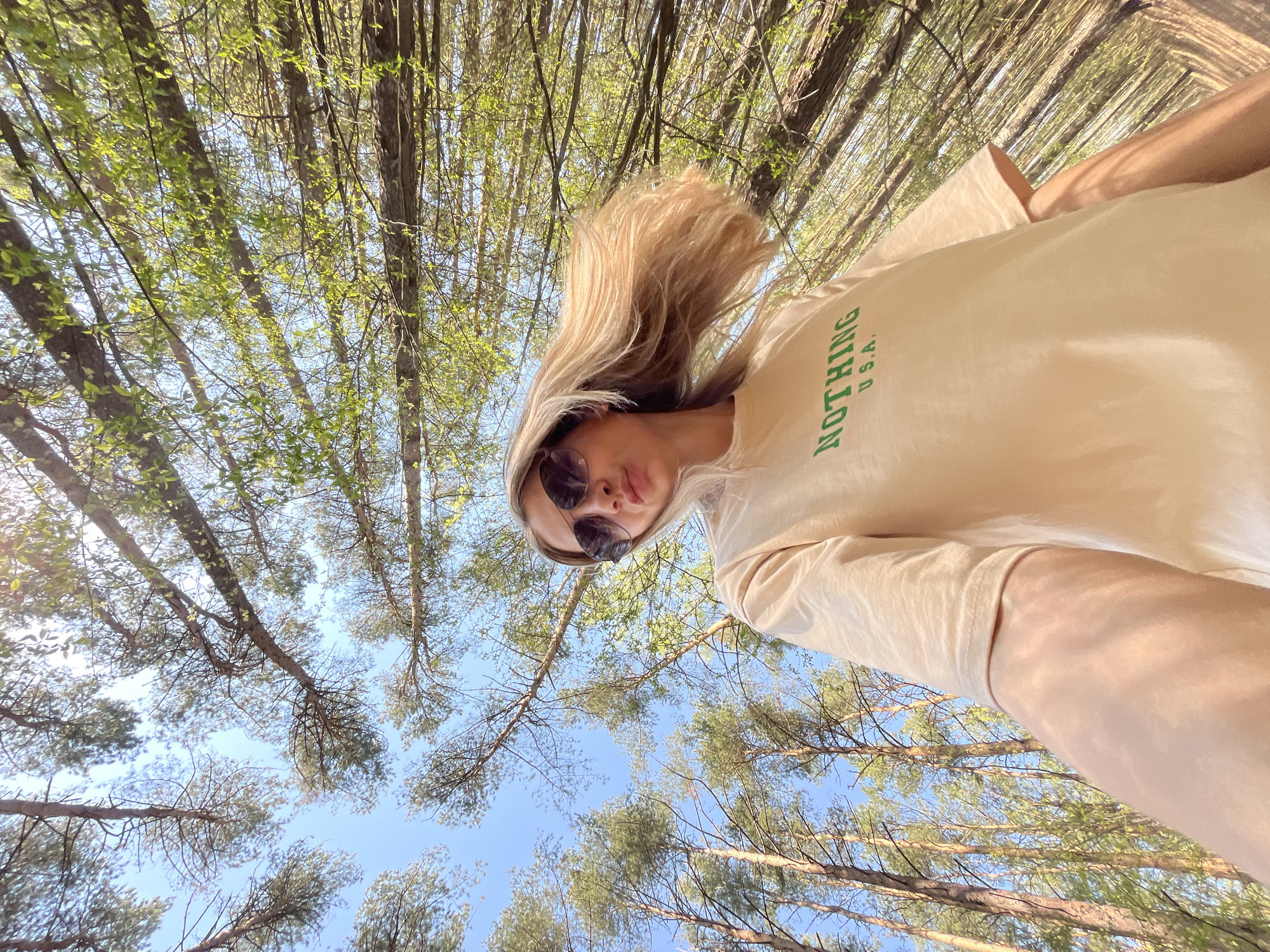 Couple photographs forest outing in Chaikovsky, Russia