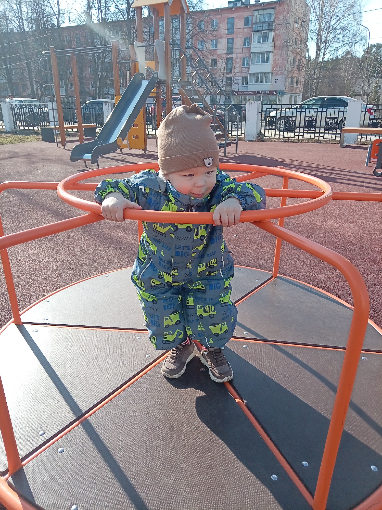 Playground scenes with child, equipment documented in early morning