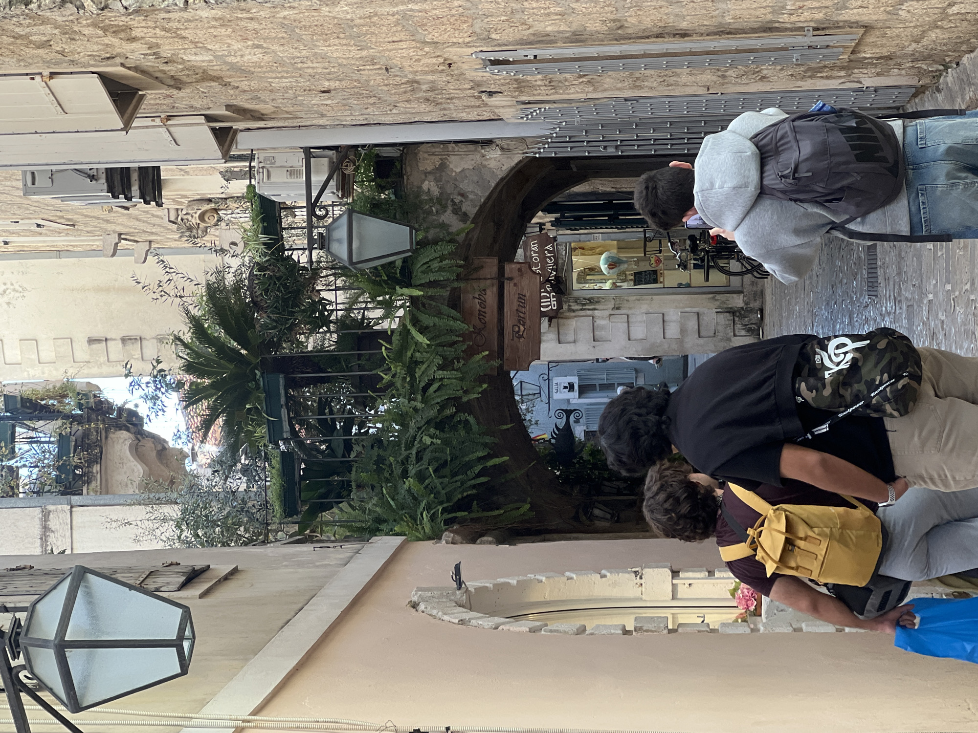 Tourist scenes documented across Budva's old town and harbor
