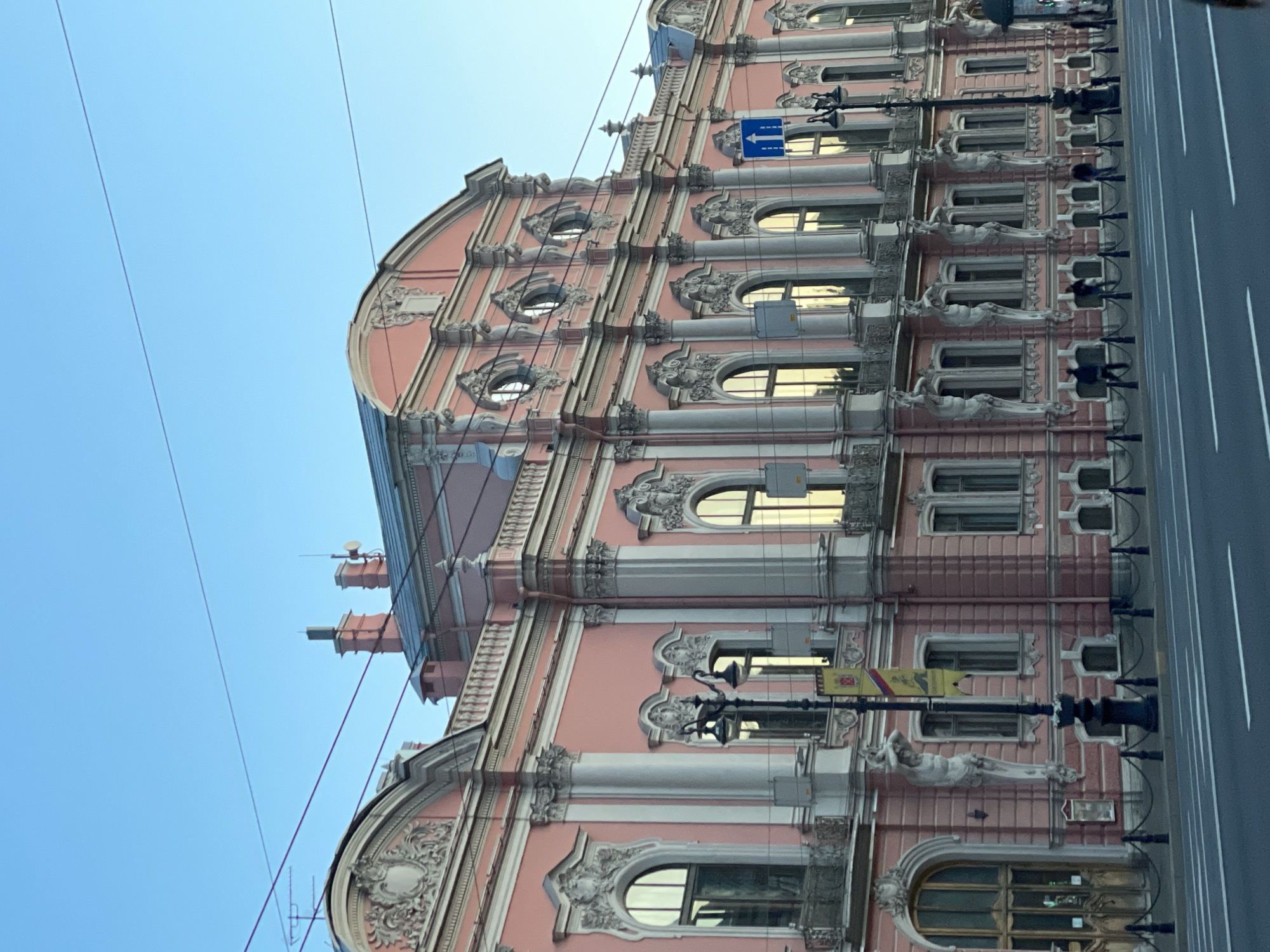 Historic pink building photographed from multiple angles in Saint Petersburg