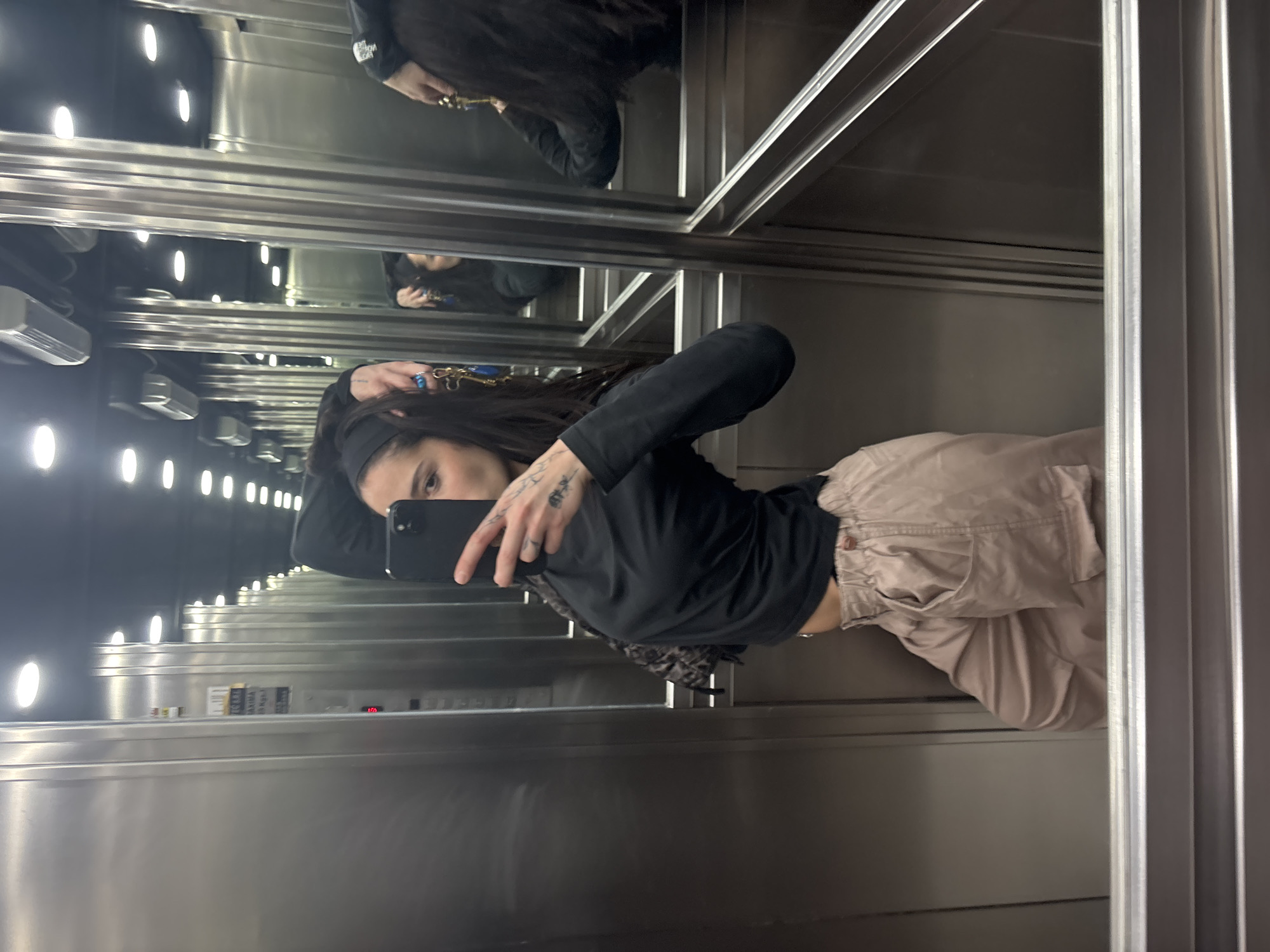 Woman takes elevator selfie in Buenos Aires