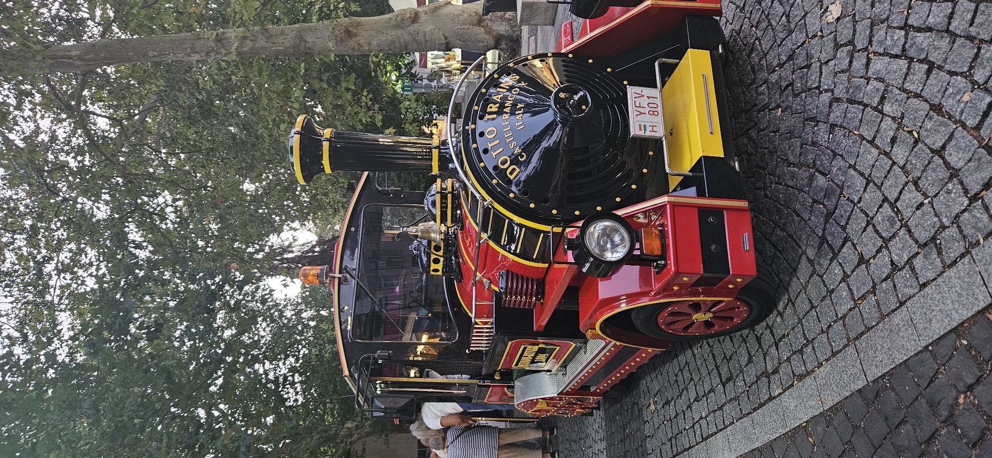 Dotto tourist train making rounds on Hévíz cobblestone streets