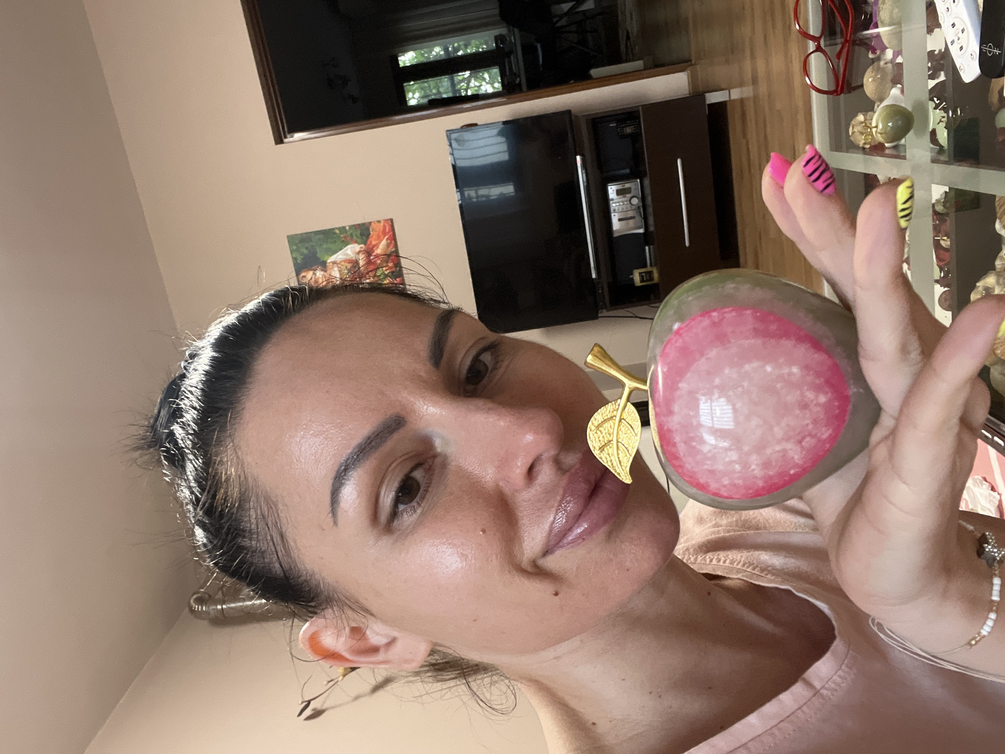 Woman photographs decorative object, artwork displayed in Stara Zagora