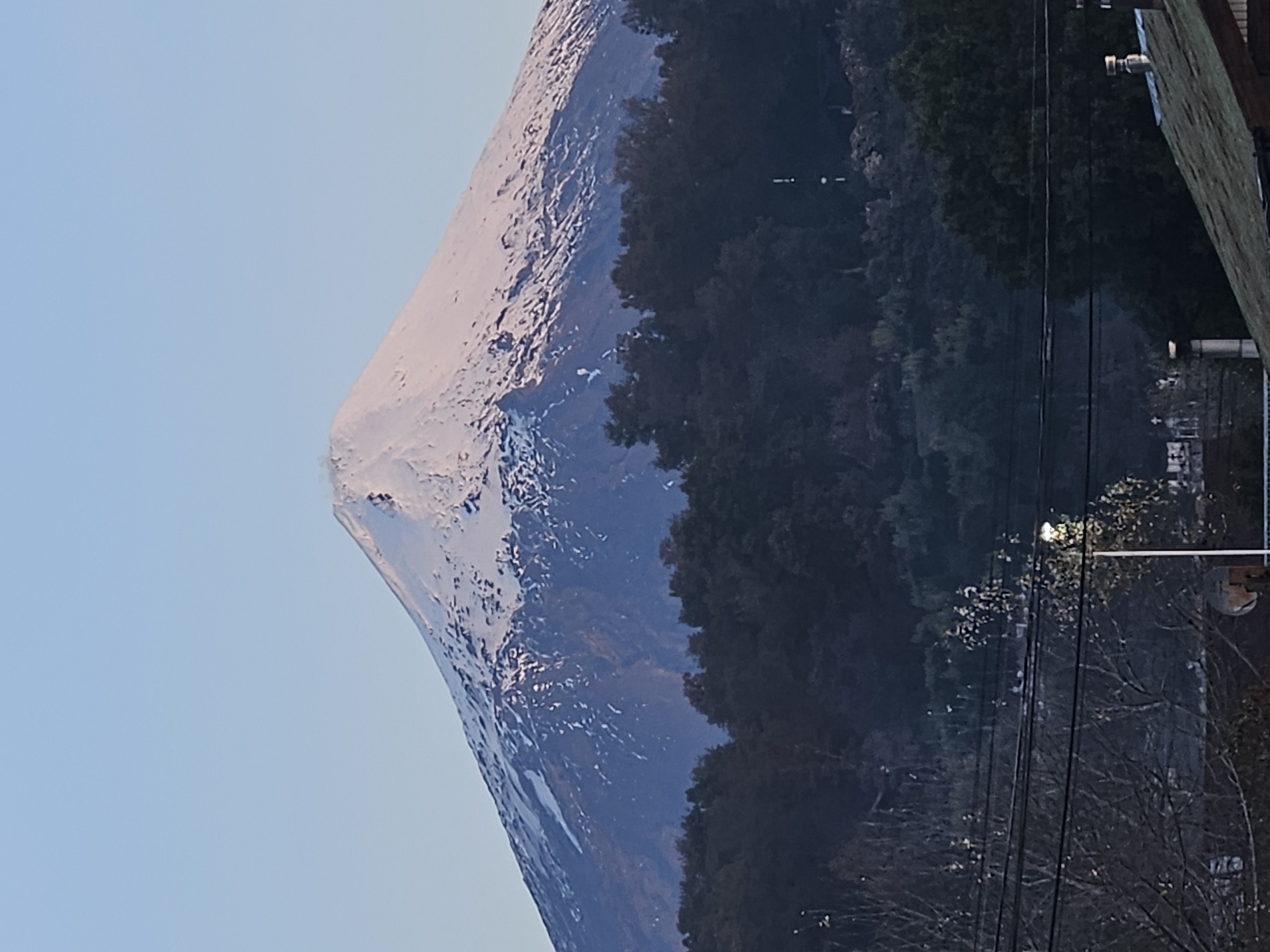 Snow-capped volcano observed near Pucón, Chile