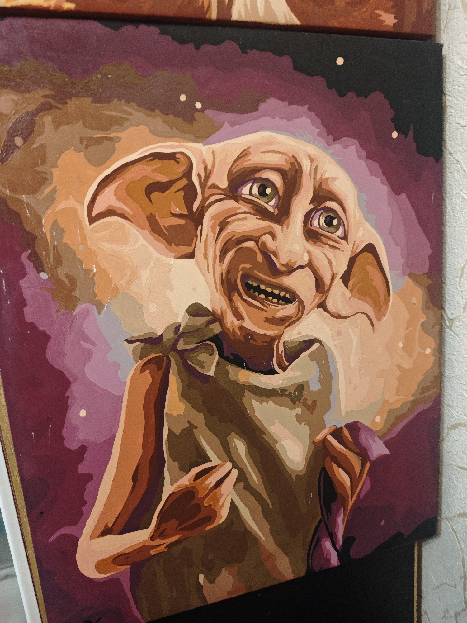 Man drinks beer near Harry Potter artwork in Samara