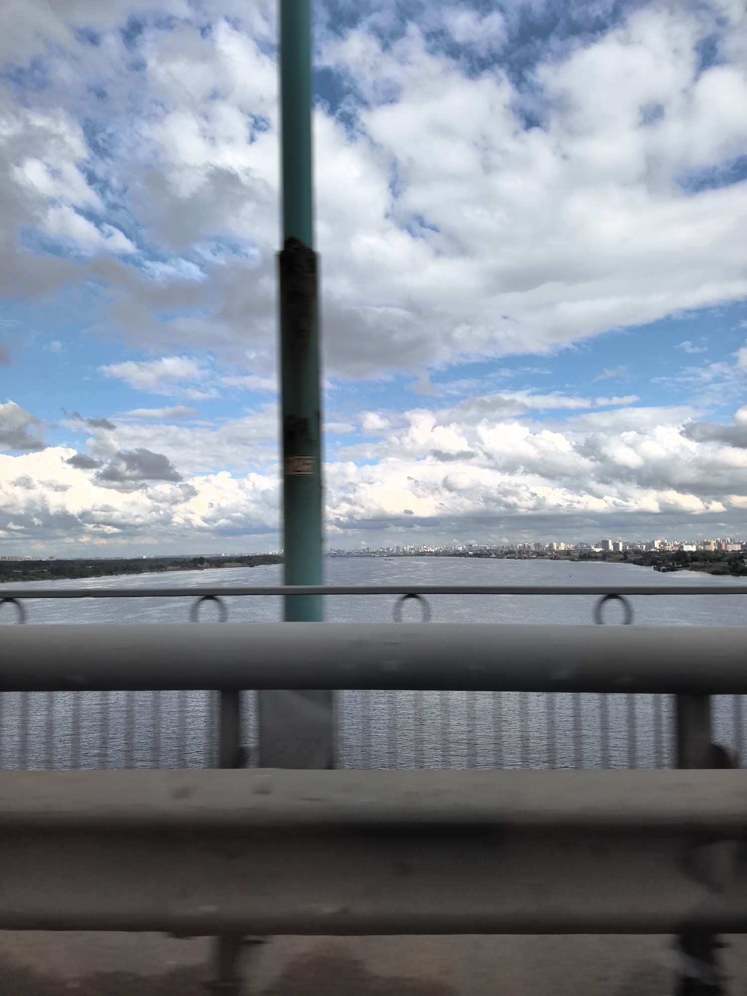 Bridge view over the broad, rippling Kama River in Perm
