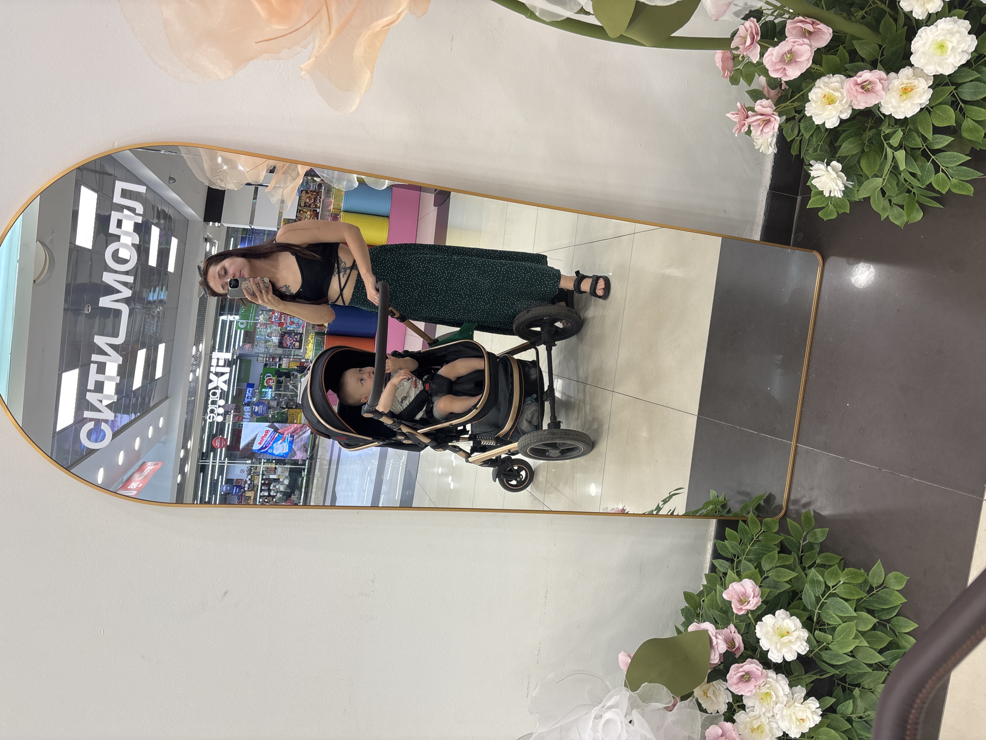 Mall stroll with a baby in Naberezhnye Chelny, Russia