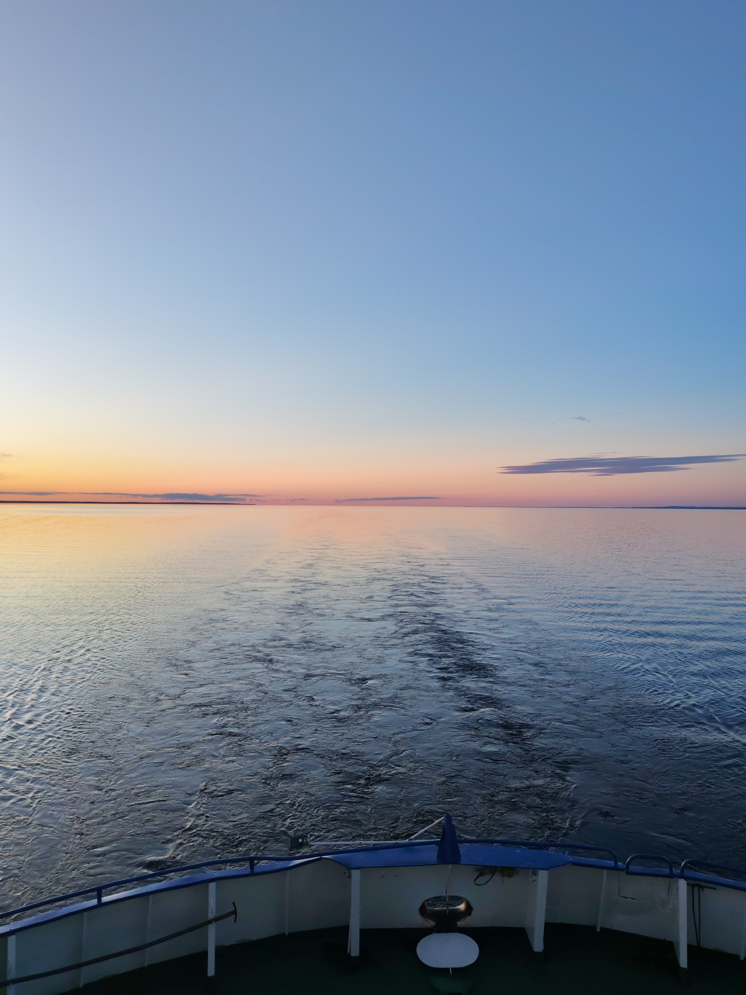 Sunset boat journey captured on Russian waters