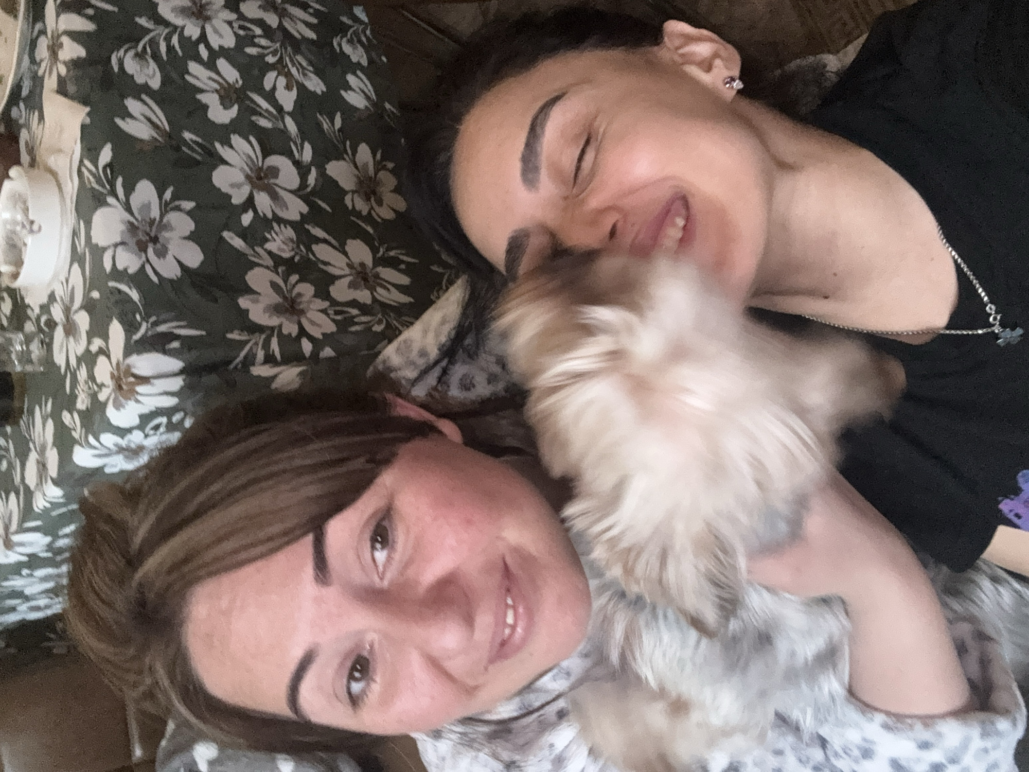 Two women share afternoon drinks with dog in Tbilisi home
