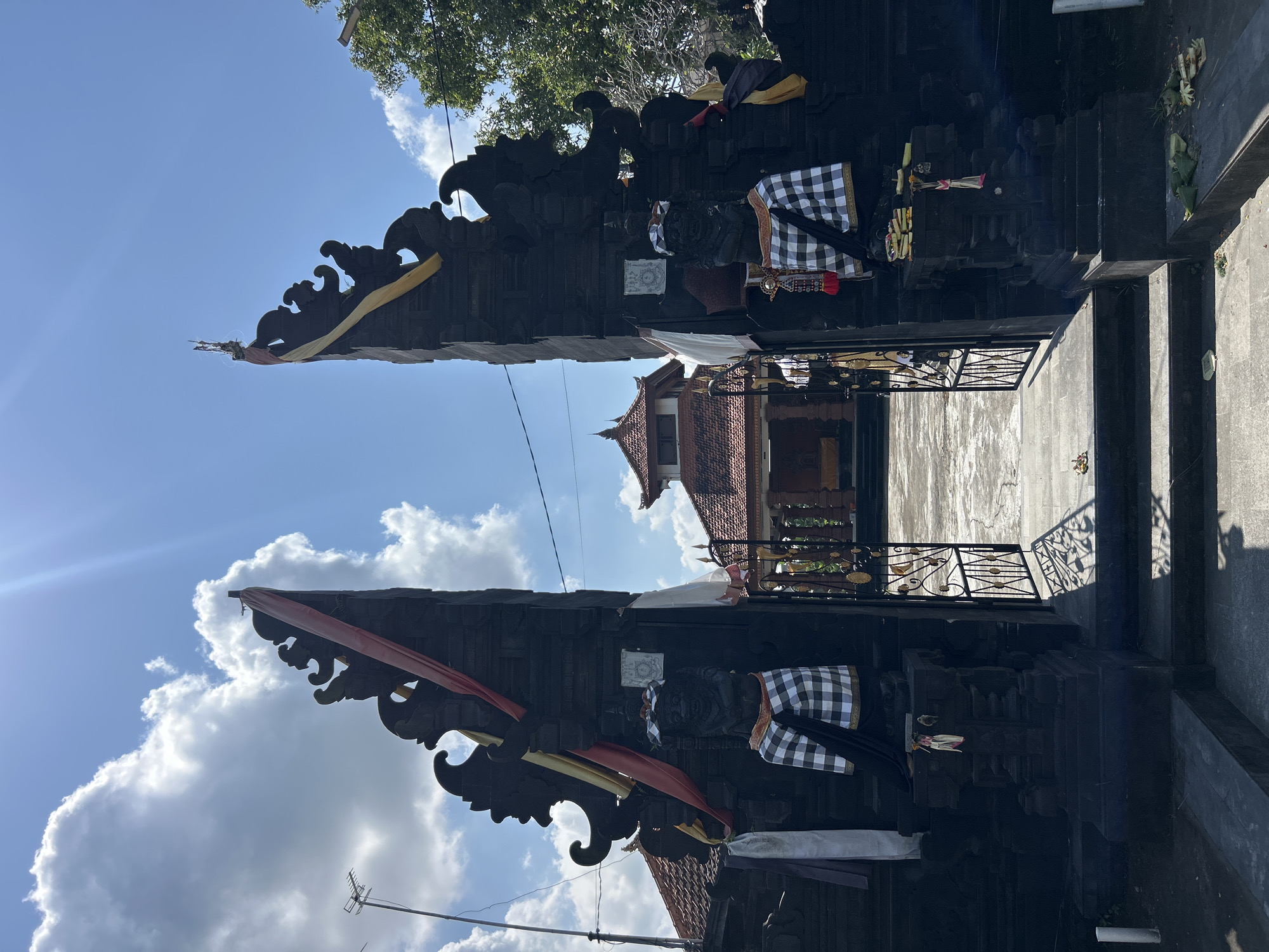Balinese temple grounds and a poodle-filled interior in Kediri