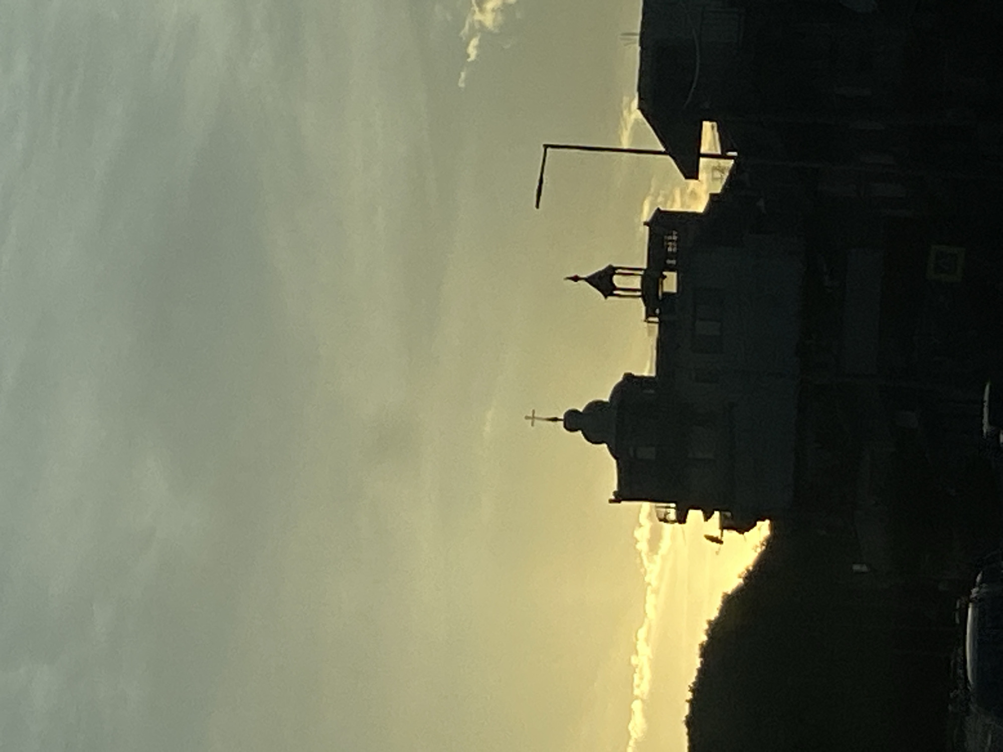 Evening silhouette of church dome captured in Sutomore, Montenegro