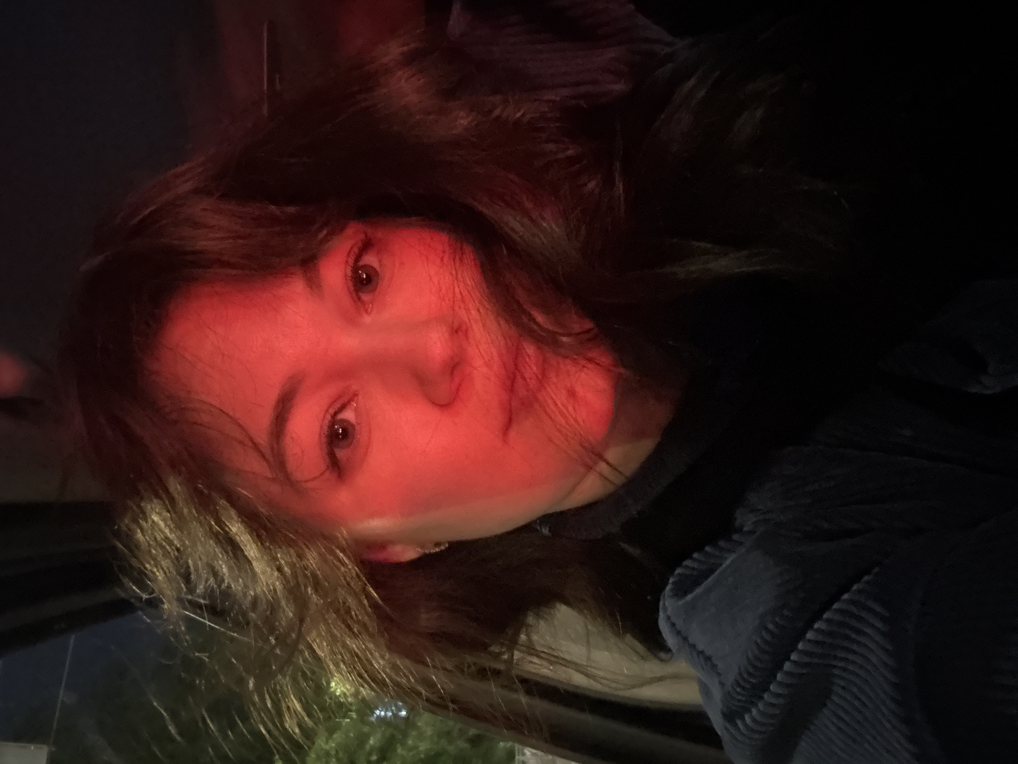 Woman takes nighttime selfies during car journey in Perm