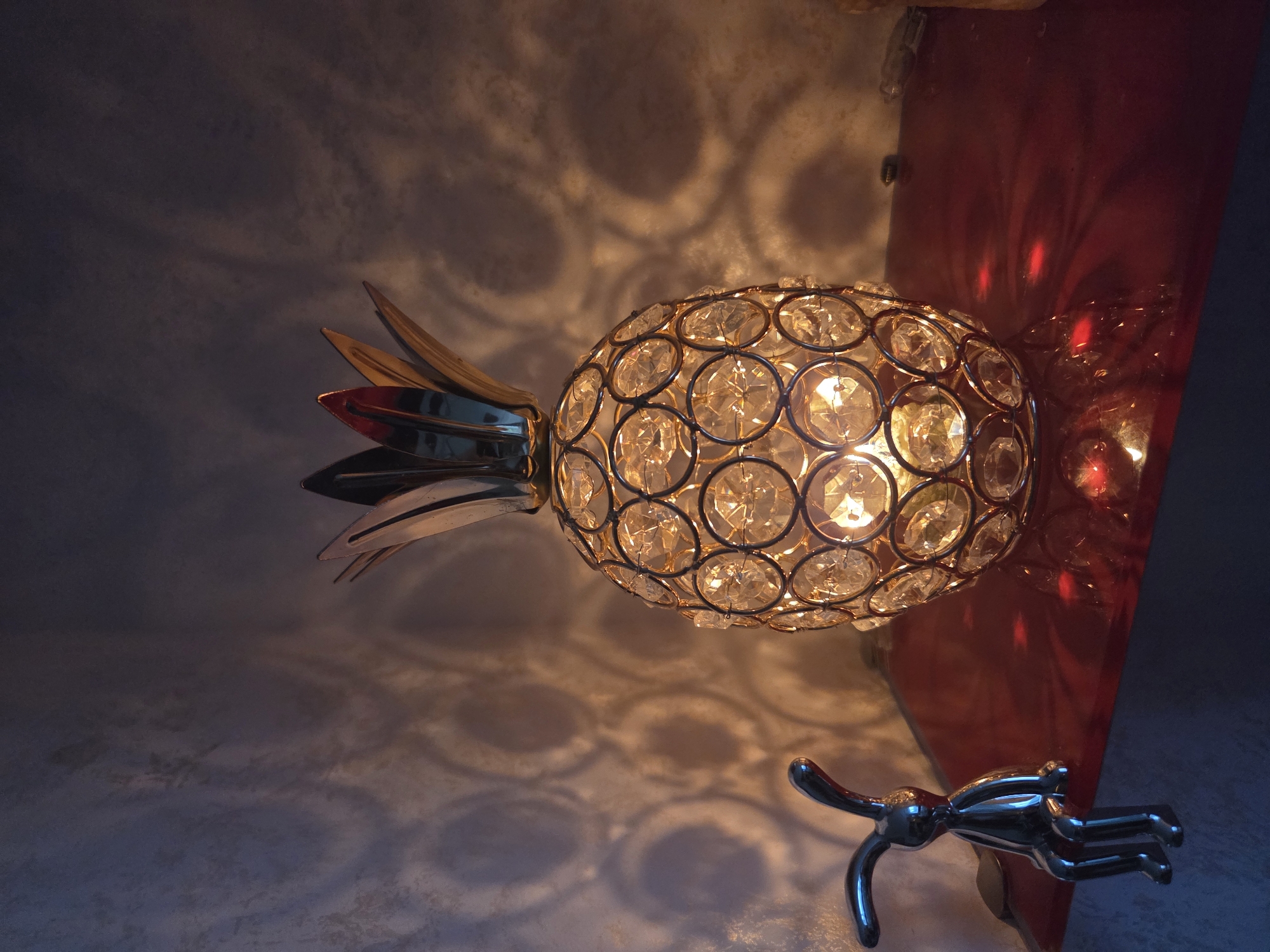 Decorative lamp and colorful figures observed in indoor setting